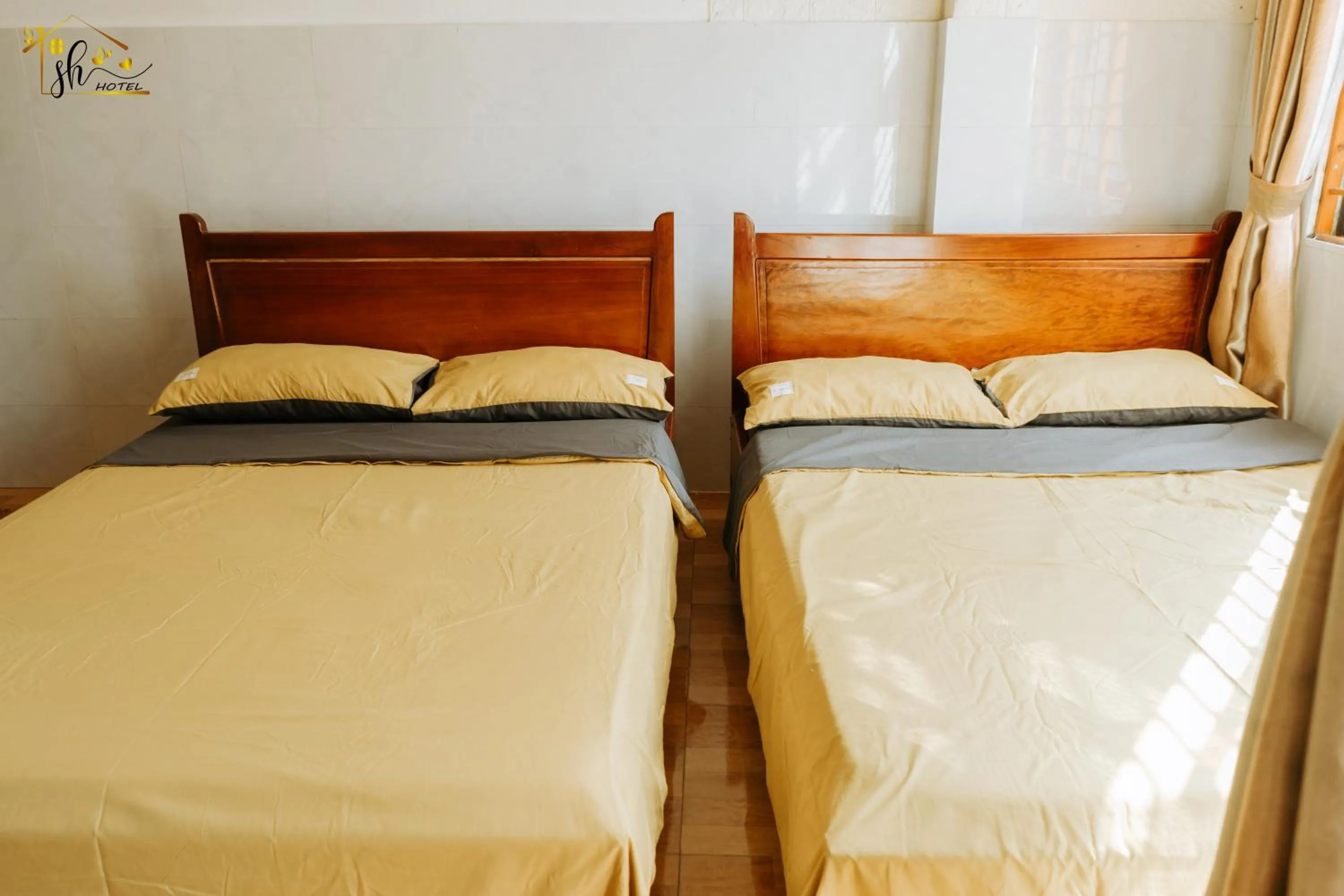 Bed in SH Hotel & Luggage storage