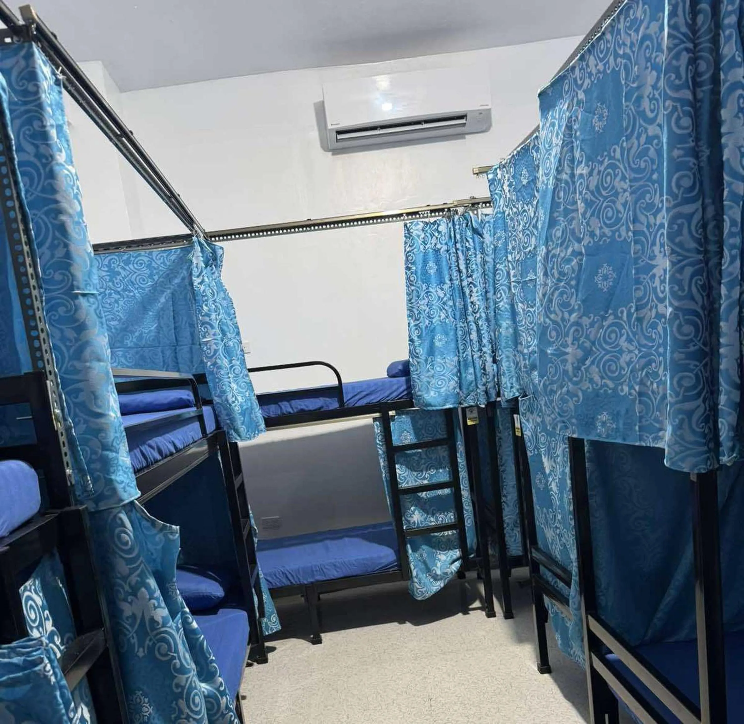 Bedroom in OYO 1155 Carnivale Inn