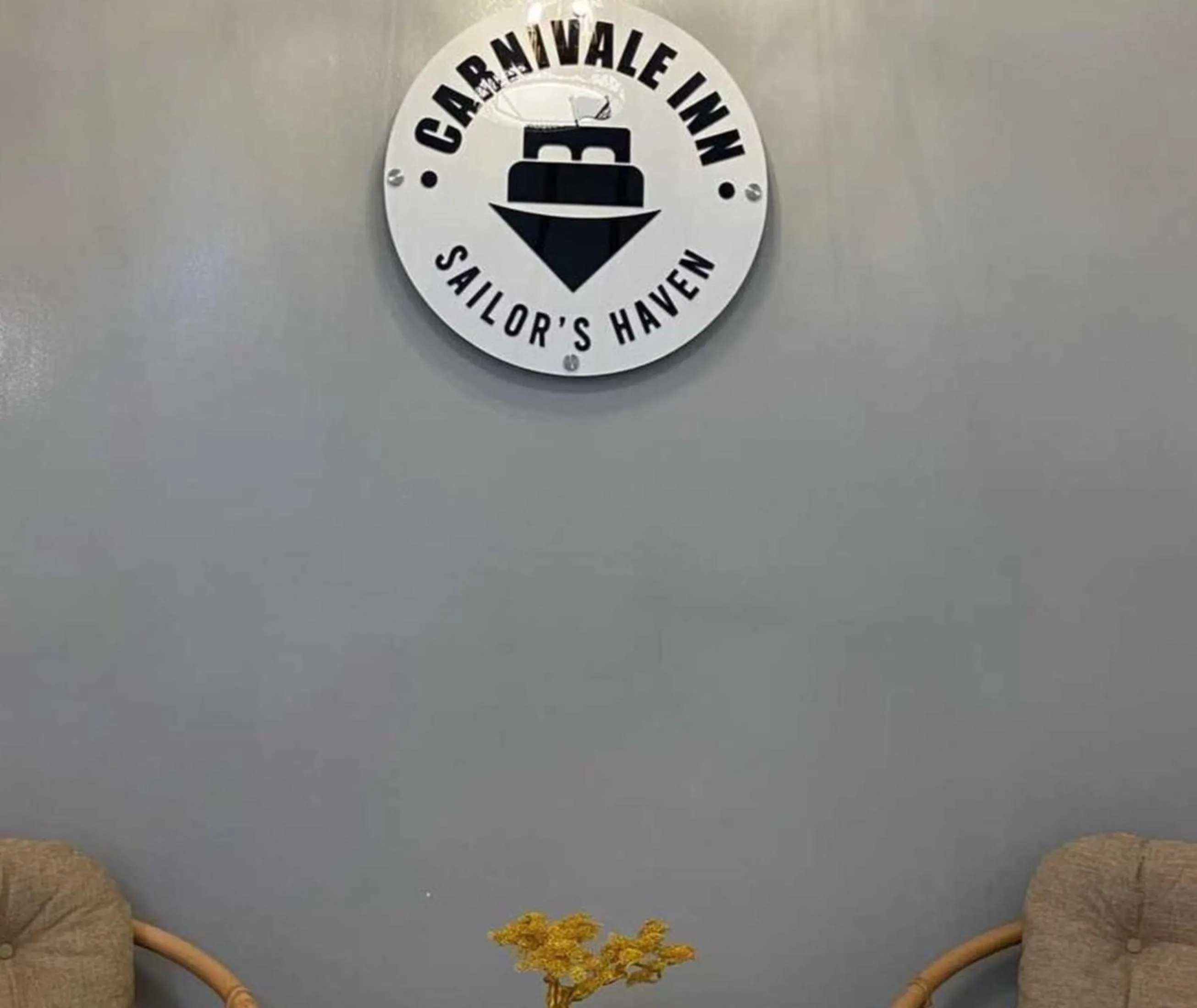 Logo/Certificate/Sign in OYO 1155 Carnivale Inn