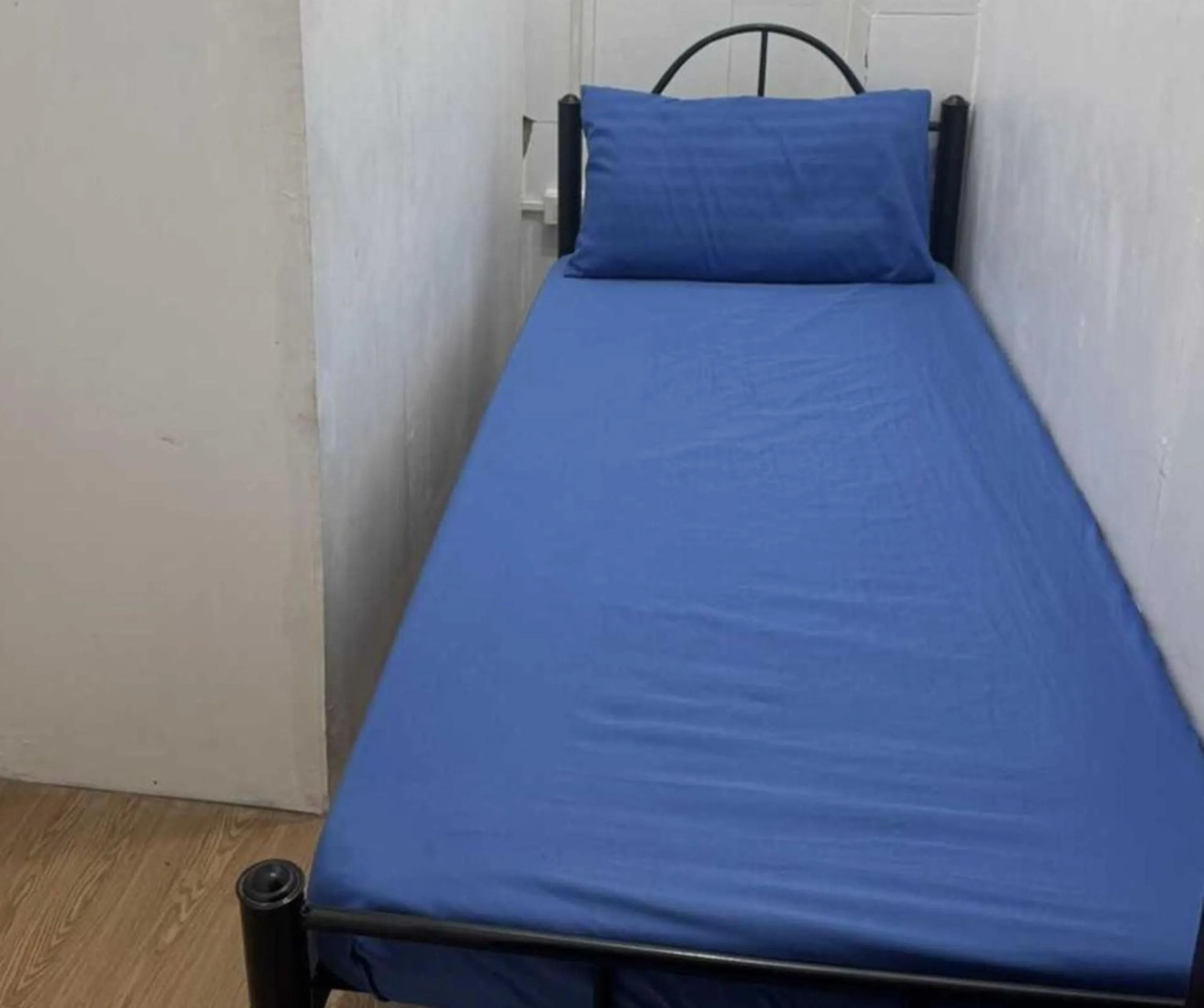 Bed in OYO 1155 Carnivale Inn