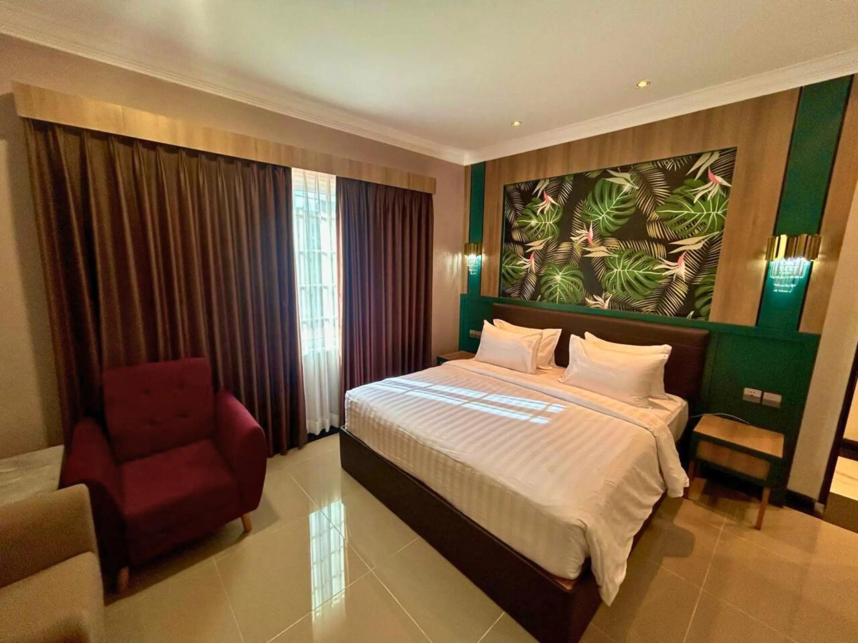 Bed in Bona Ventura Hotel & Skybar