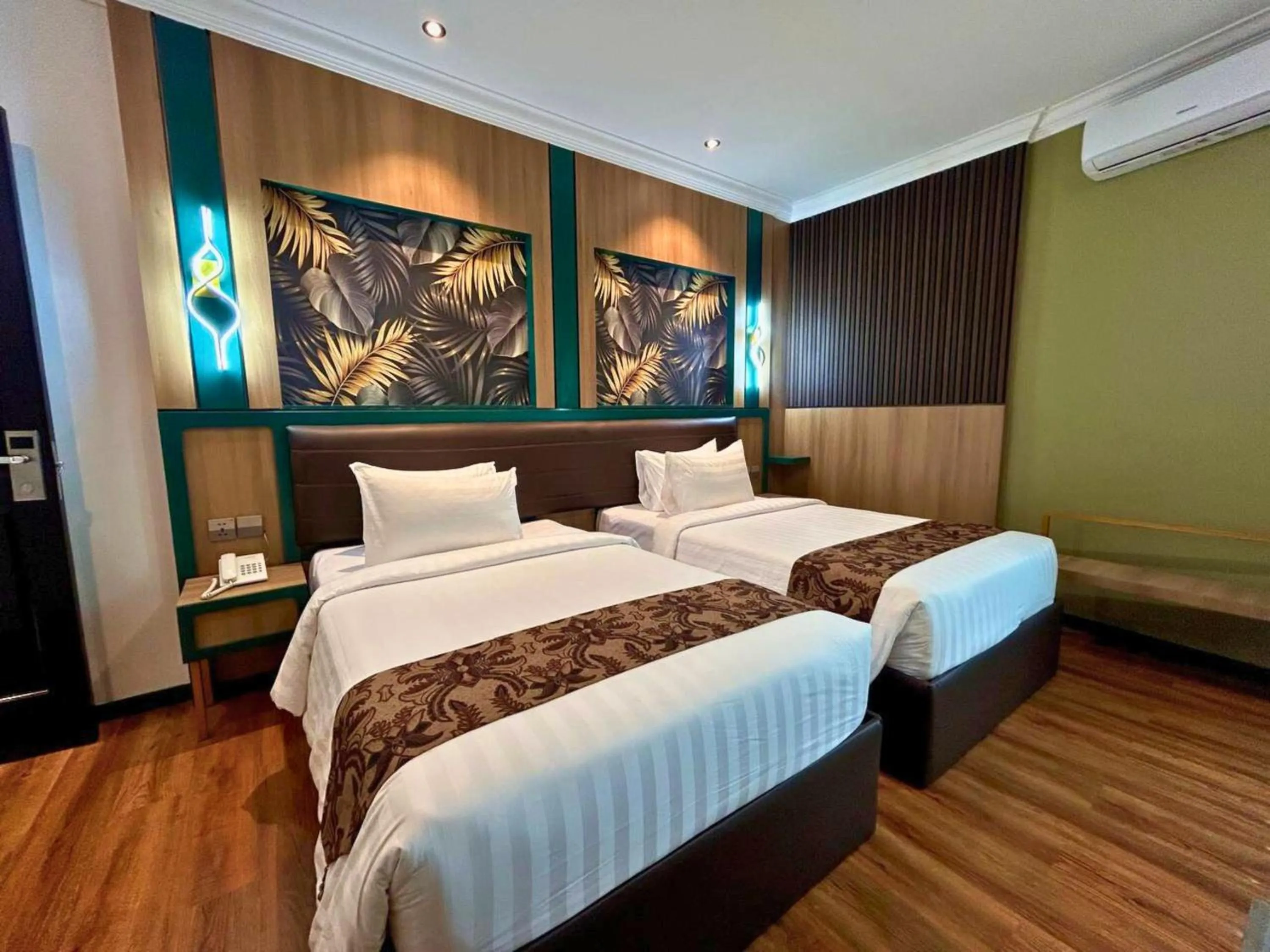 Bed in Bona Ventura Hotel & Skybar