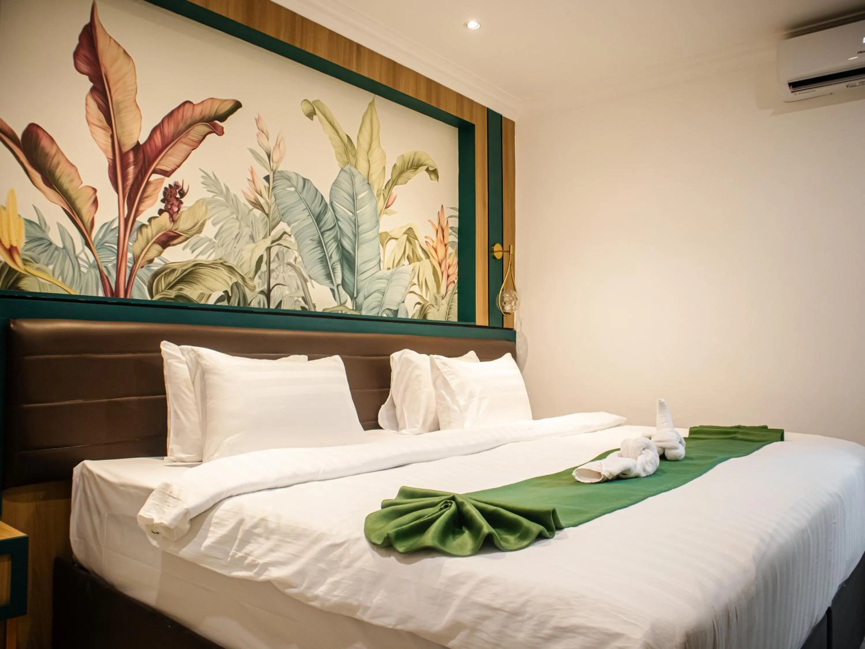 Bed in Bona Ventura Hotel & Skybar