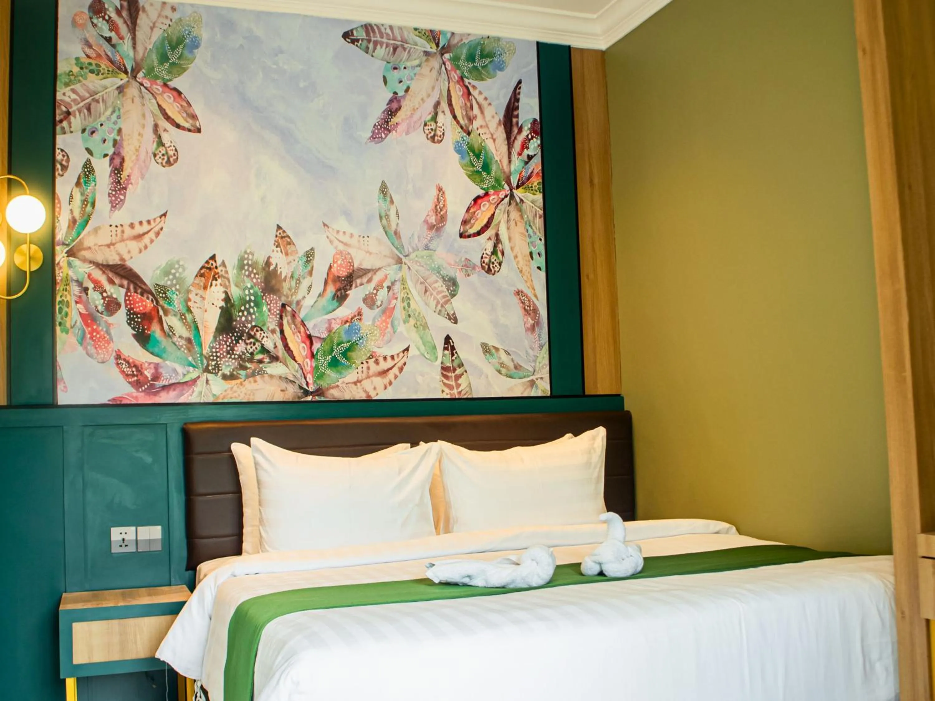 Bed in Bona Ventura Hotel & Skybar