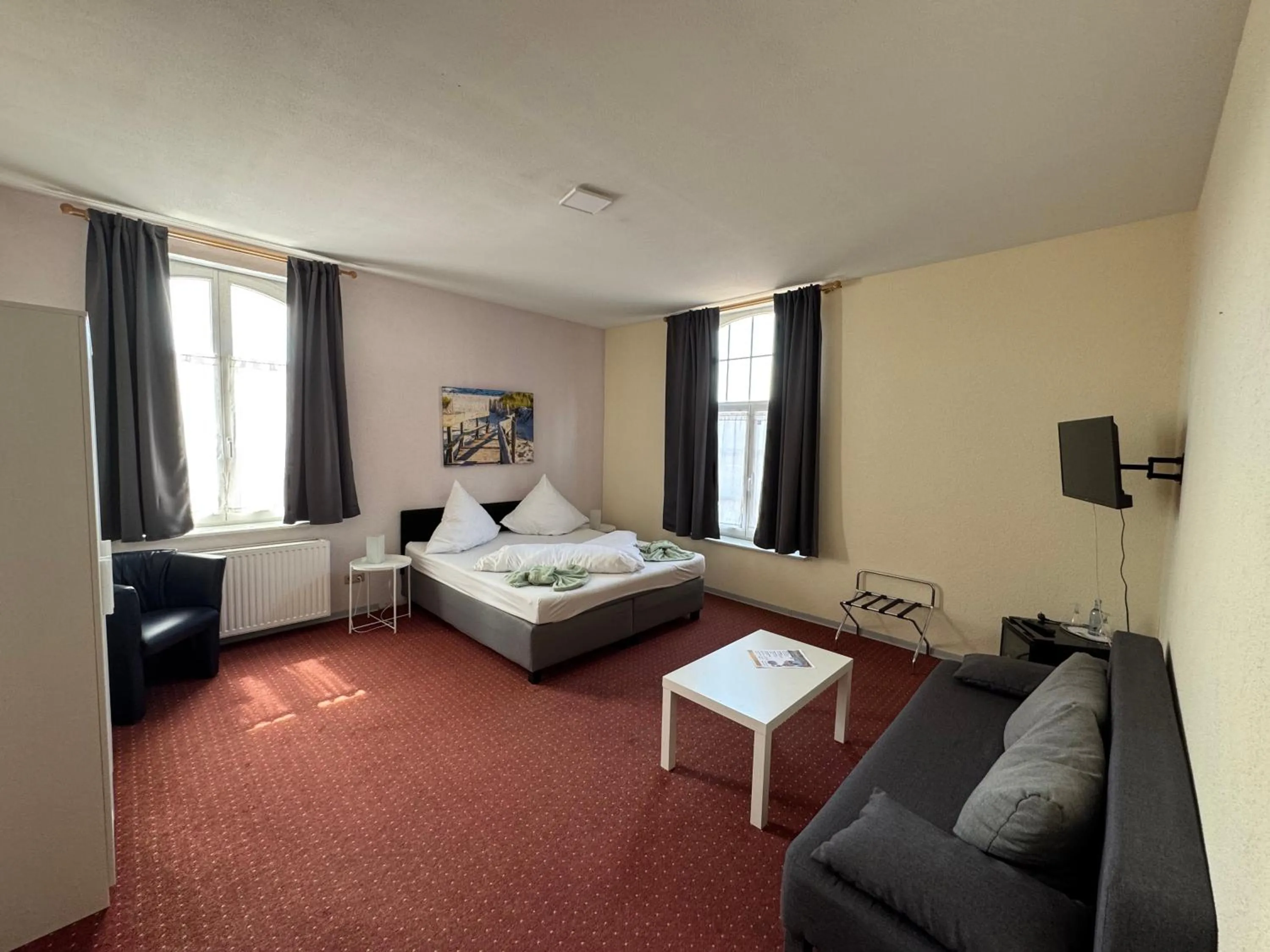 Living room, Bed in Hotel-Restaurant Christine