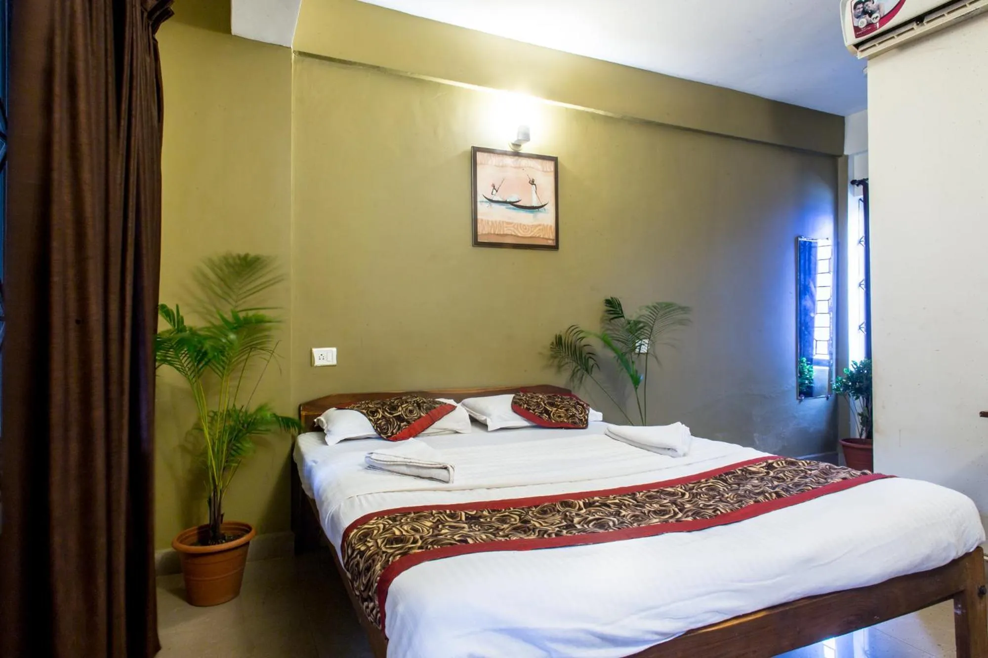 Bed in Kartik Resort