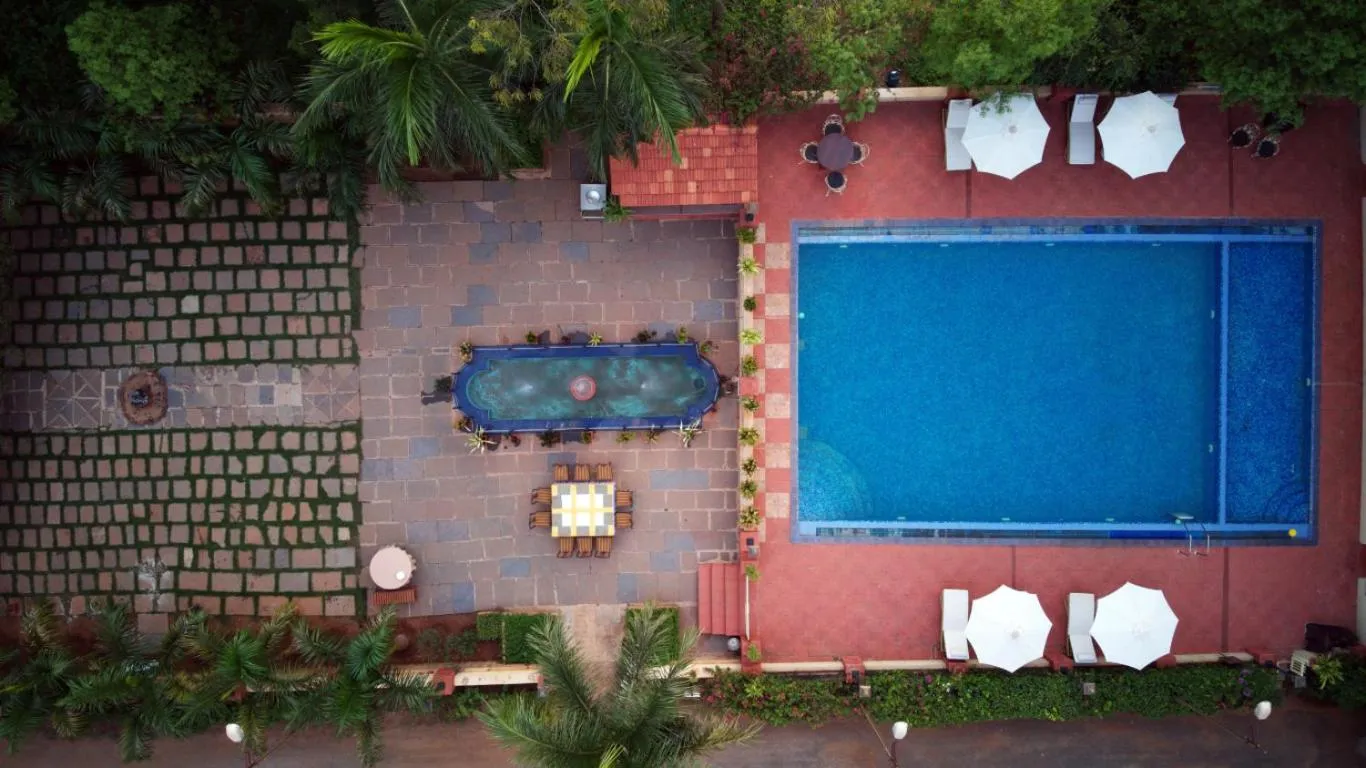 Swimming pool in WelcomHeritage Shivavilas Palace, HAMPI