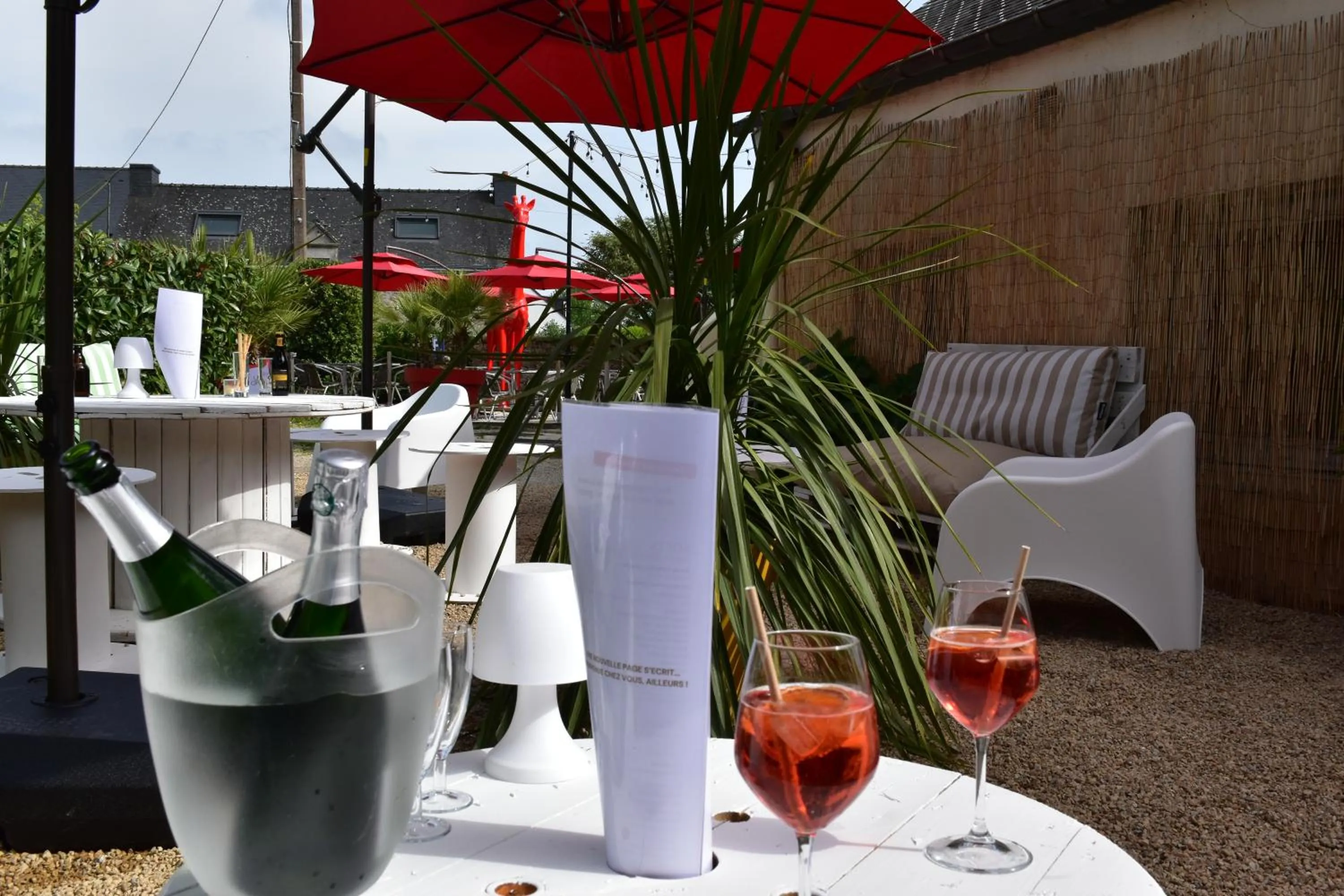 Patio in Logis Hôtel Vannes Nord Le Clos Des Hortensias