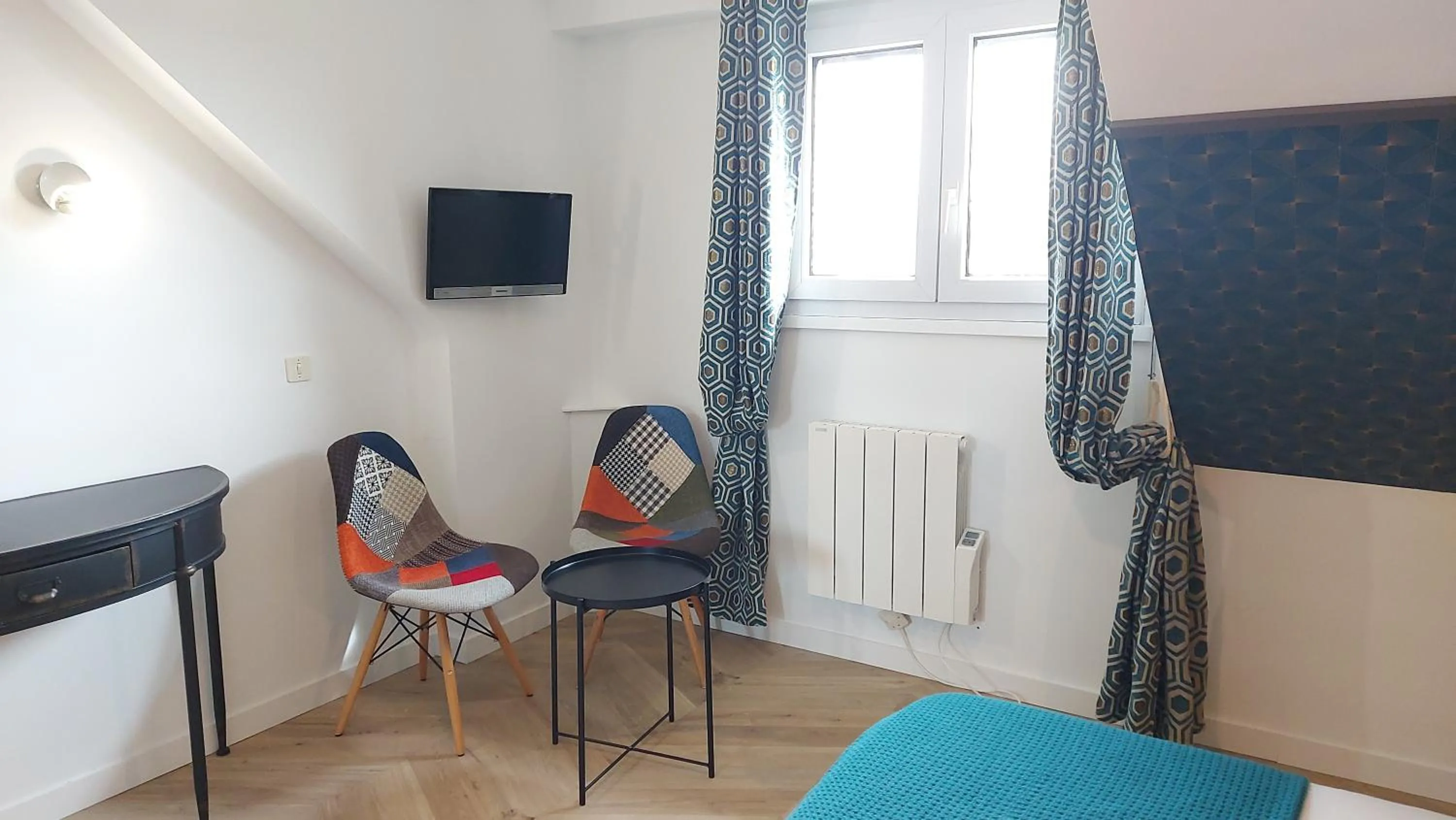 Living room in Logis Hôtel Vannes Nord Le Clos Des Hortensias