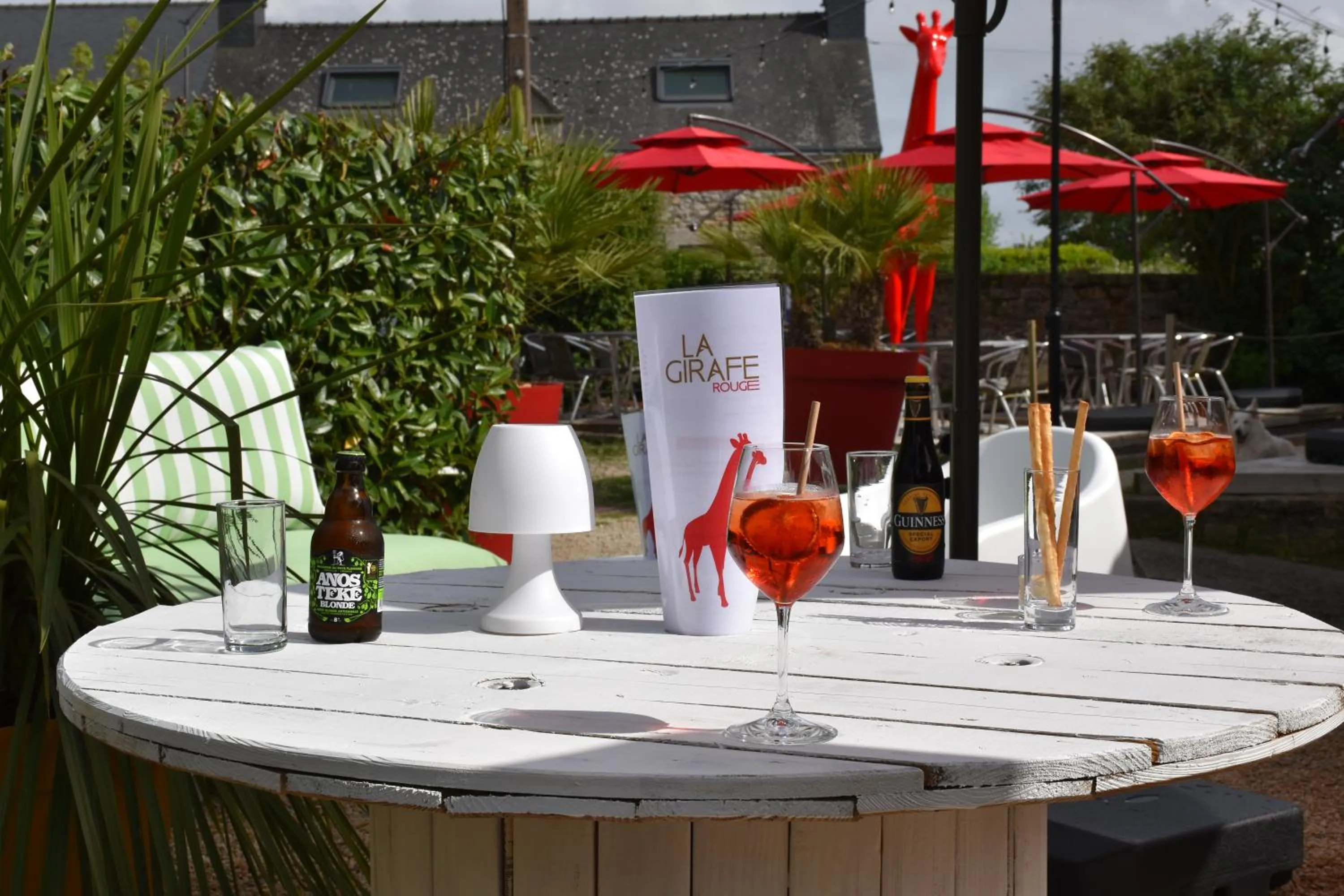 Patio in Logis Hôtel Vannes Nord Le Clos Des Hortensias
