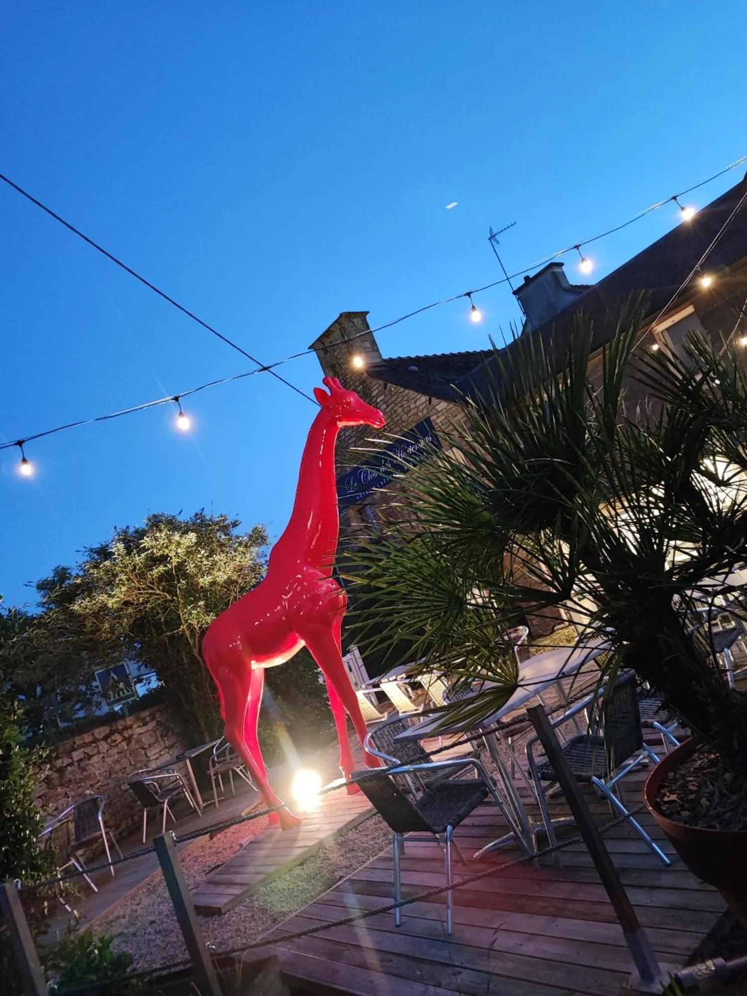 Patio in Logis Hôtel Vannes Nord Le Clos Des Hortensias