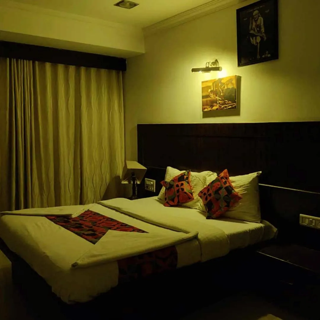 Bed in Hotel Shree Sai Wada