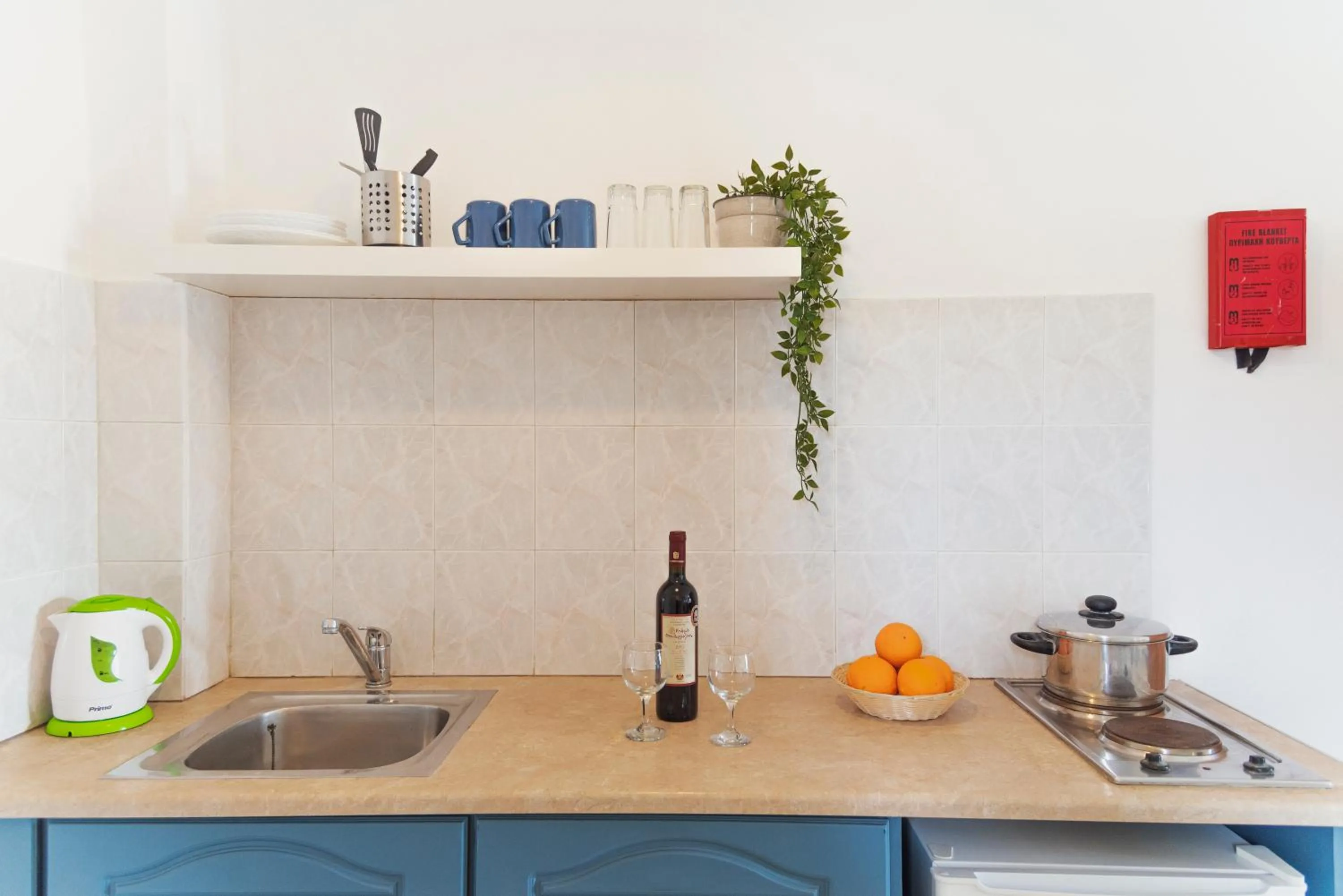 Kitchen or kitchenette in Ammos Apartments