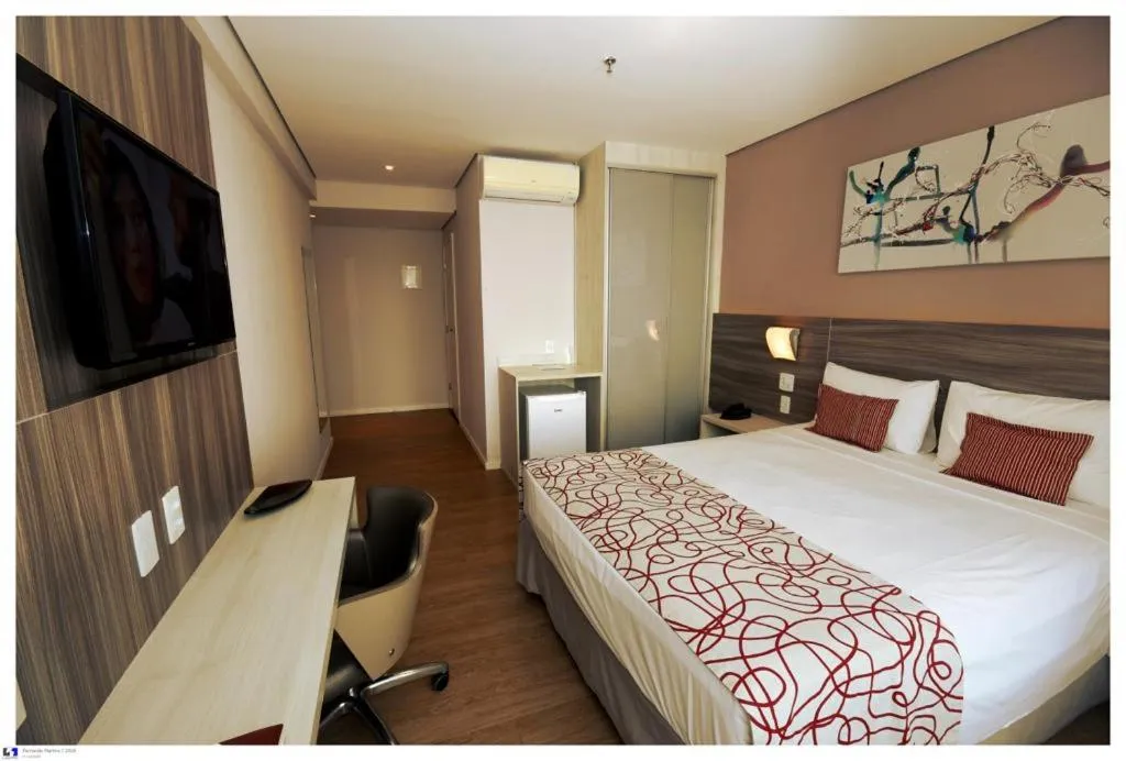 Bed in IT Itabira Hotel