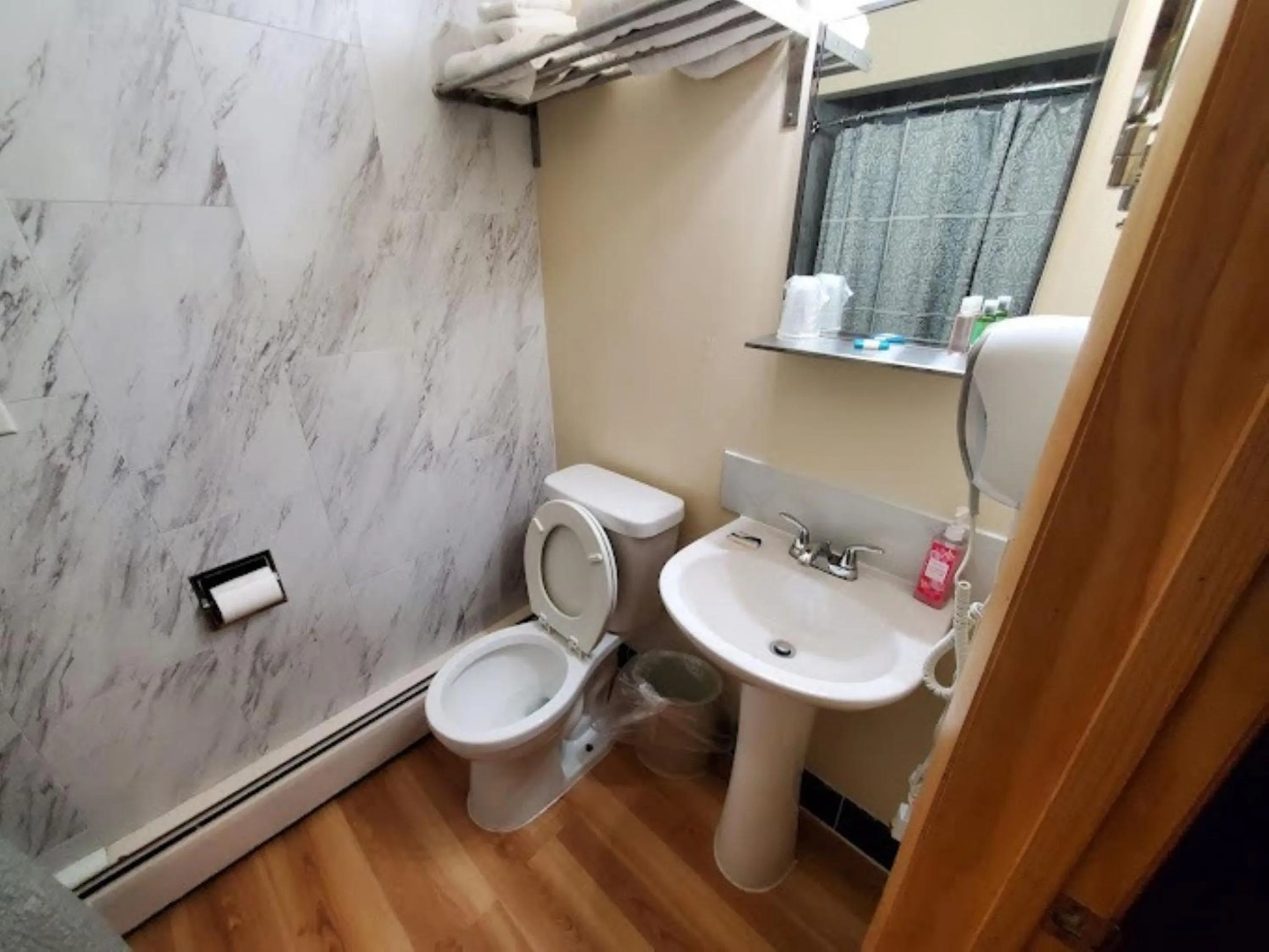 Bathroom in Wisconsin-Aire Motel By OYO Random Lake