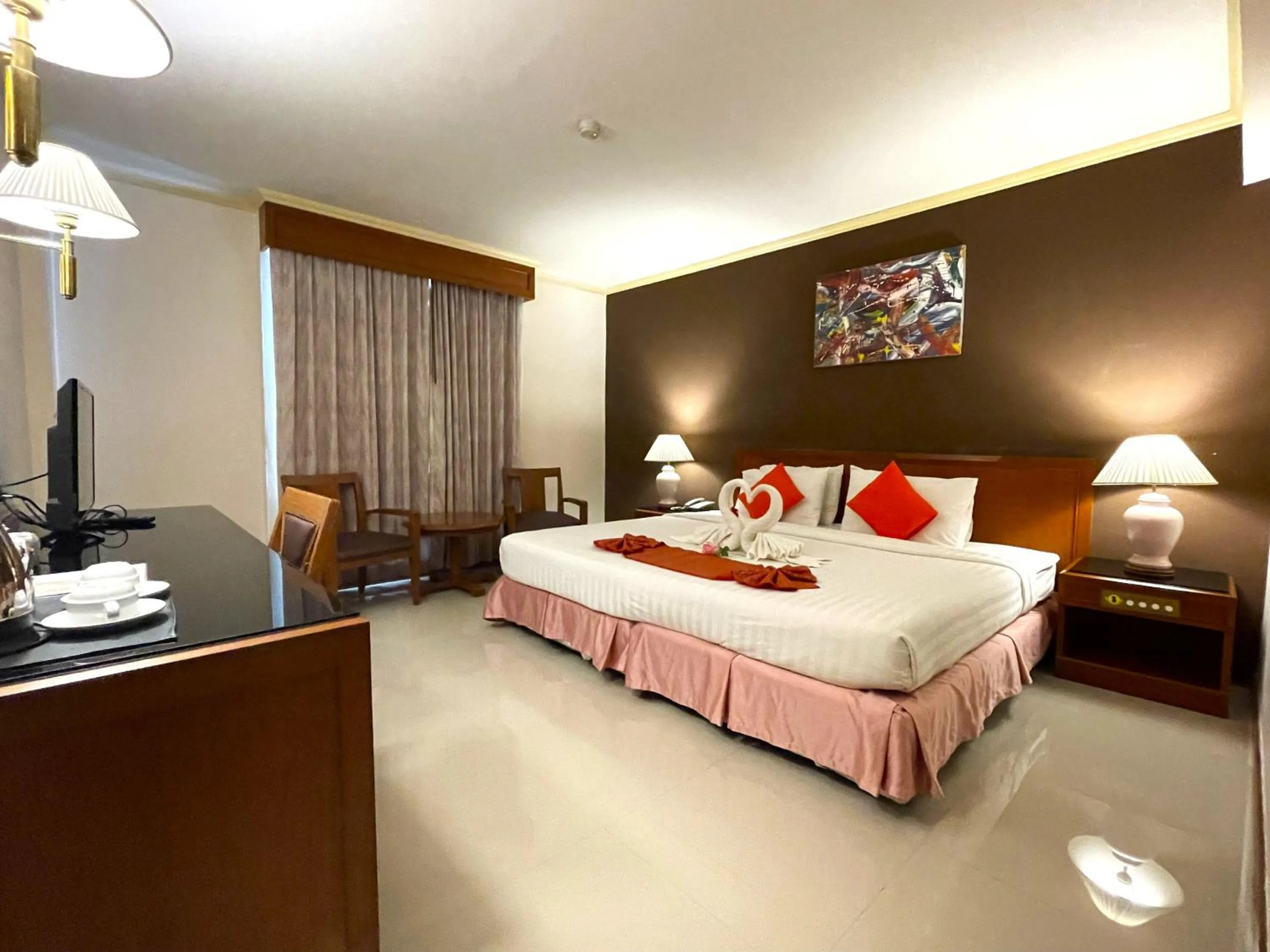 Bed in Songphanburi Hotel