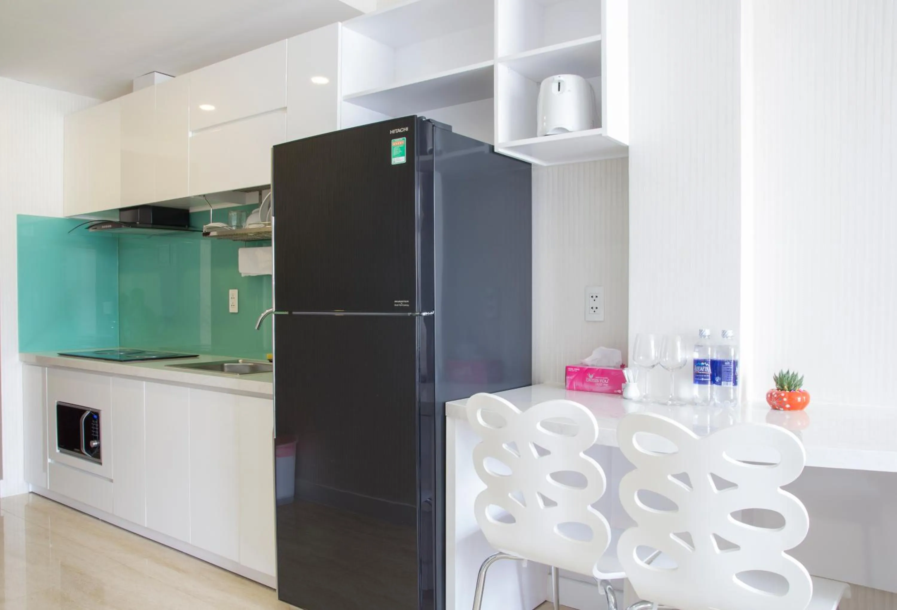 Kitchen or kitchenette in Sunny Serviced Apartment