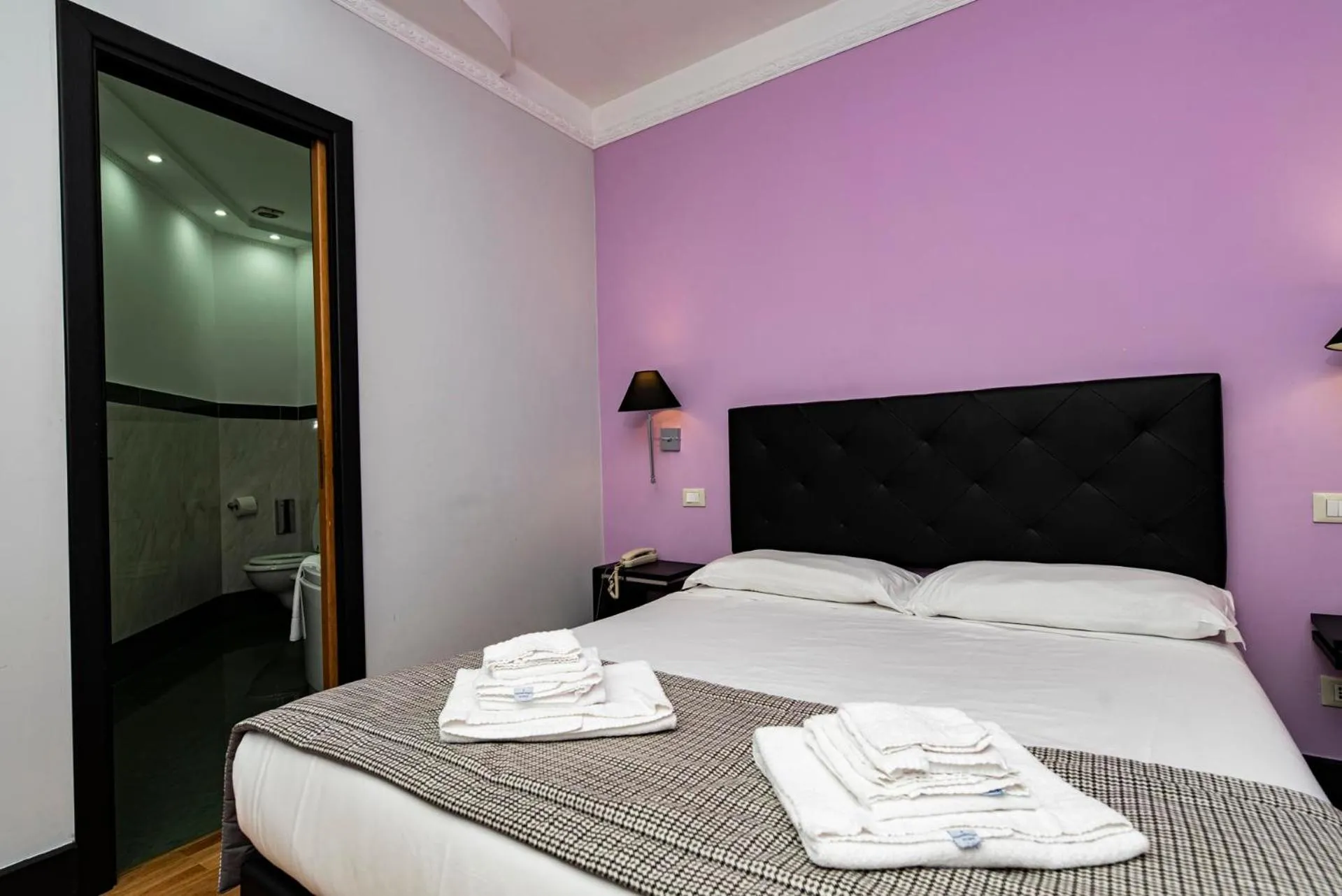 Bed in Imperium Suite Navona