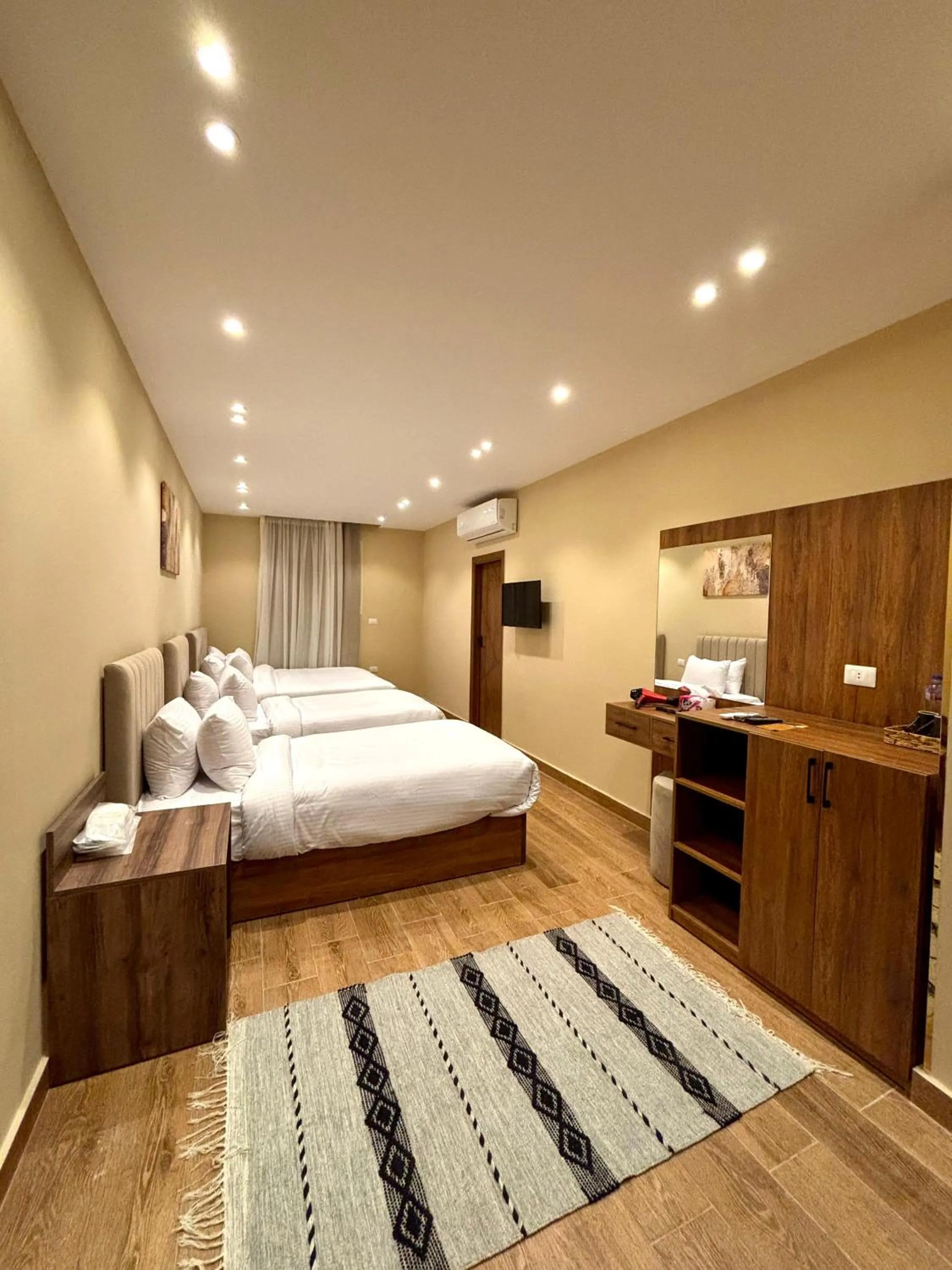 Bed in The Palace Pyramids View Hotel