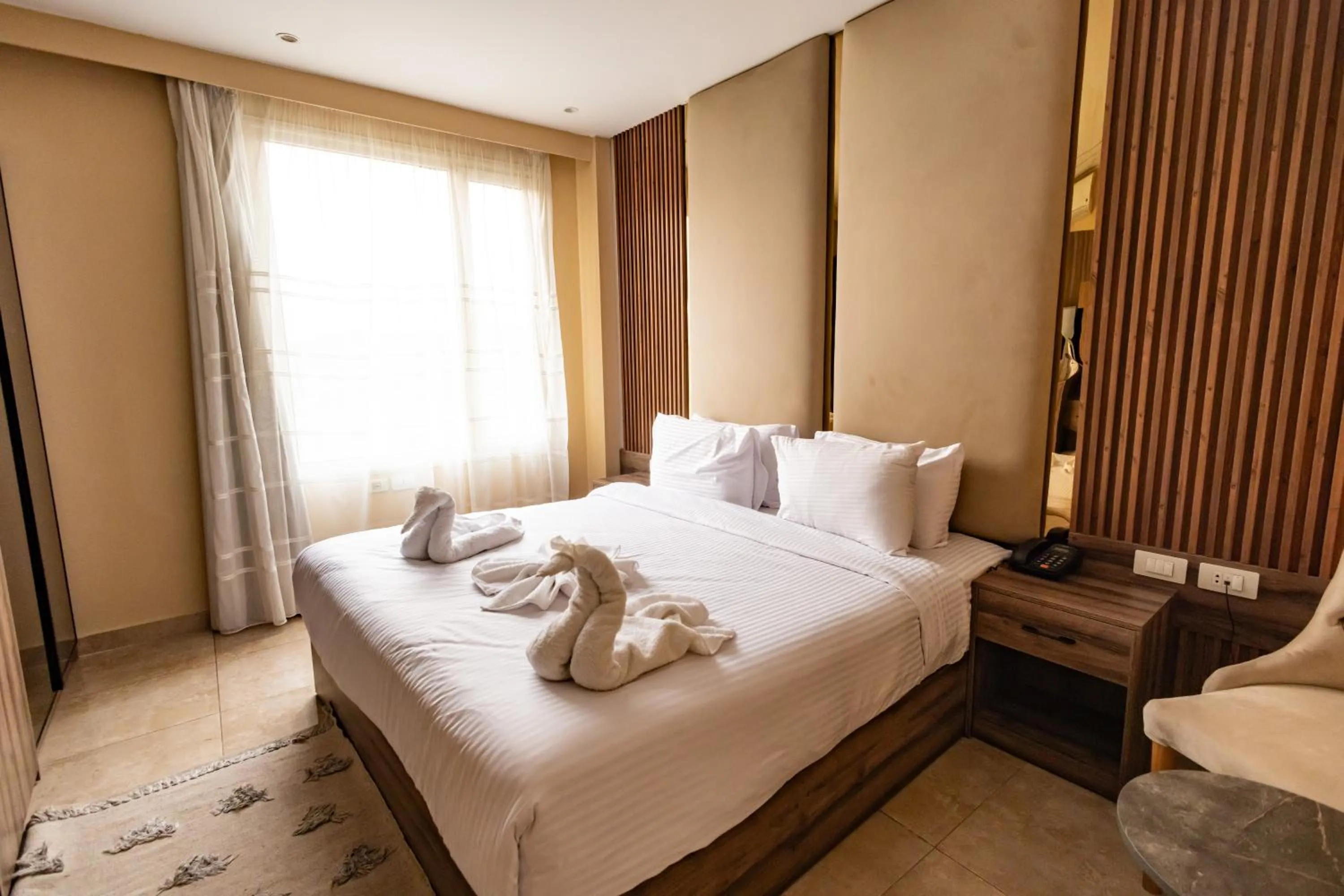 Bed in The Palace Pyramids View Hotel