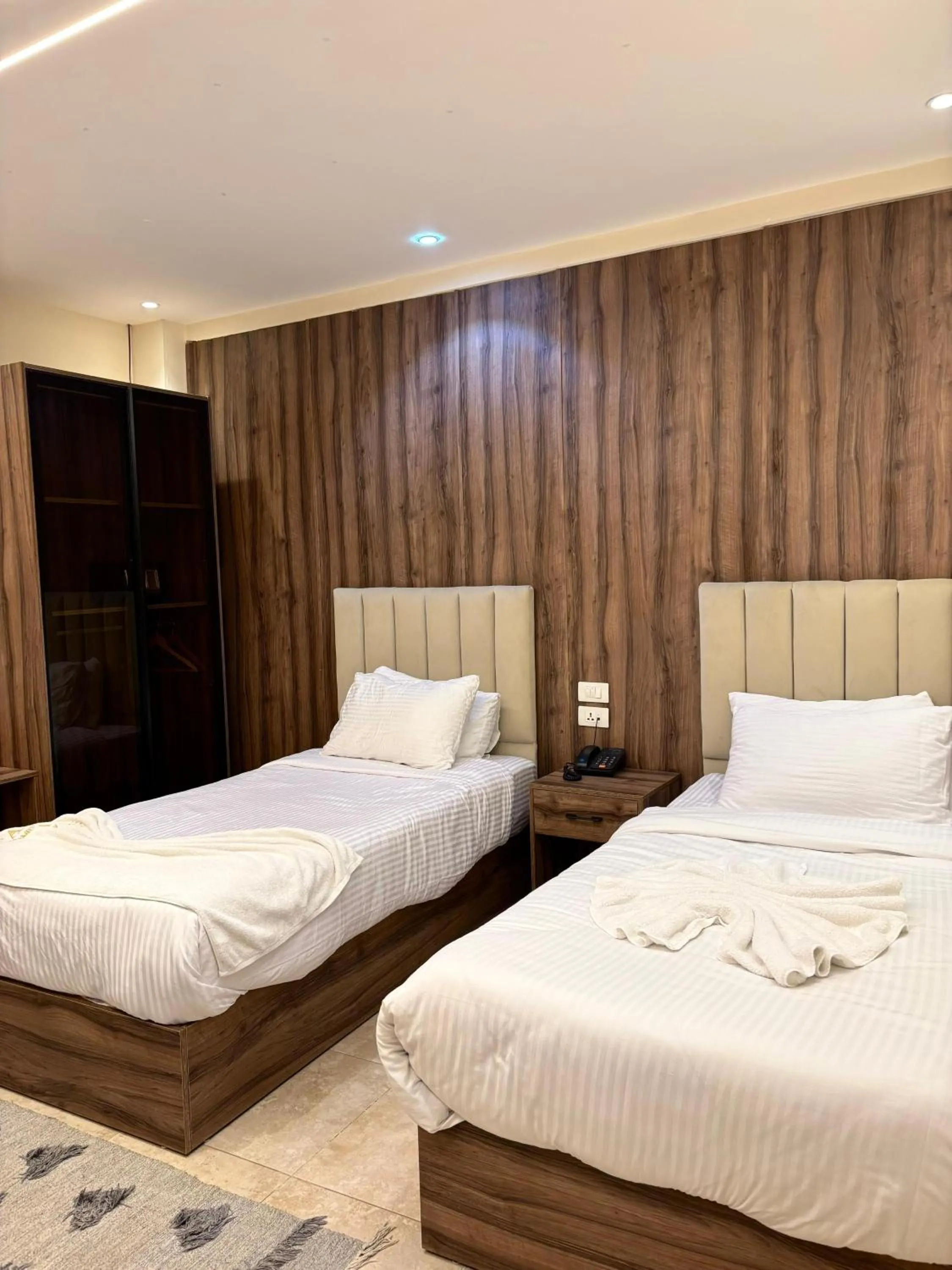 Bed in The Palace Pyramids View Hotel