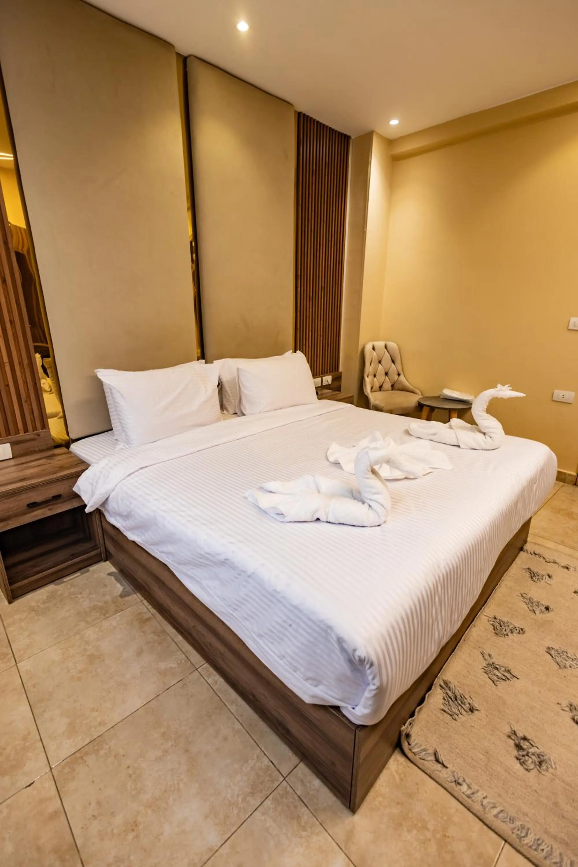 Bed in The Palace Pyramids View Hotel