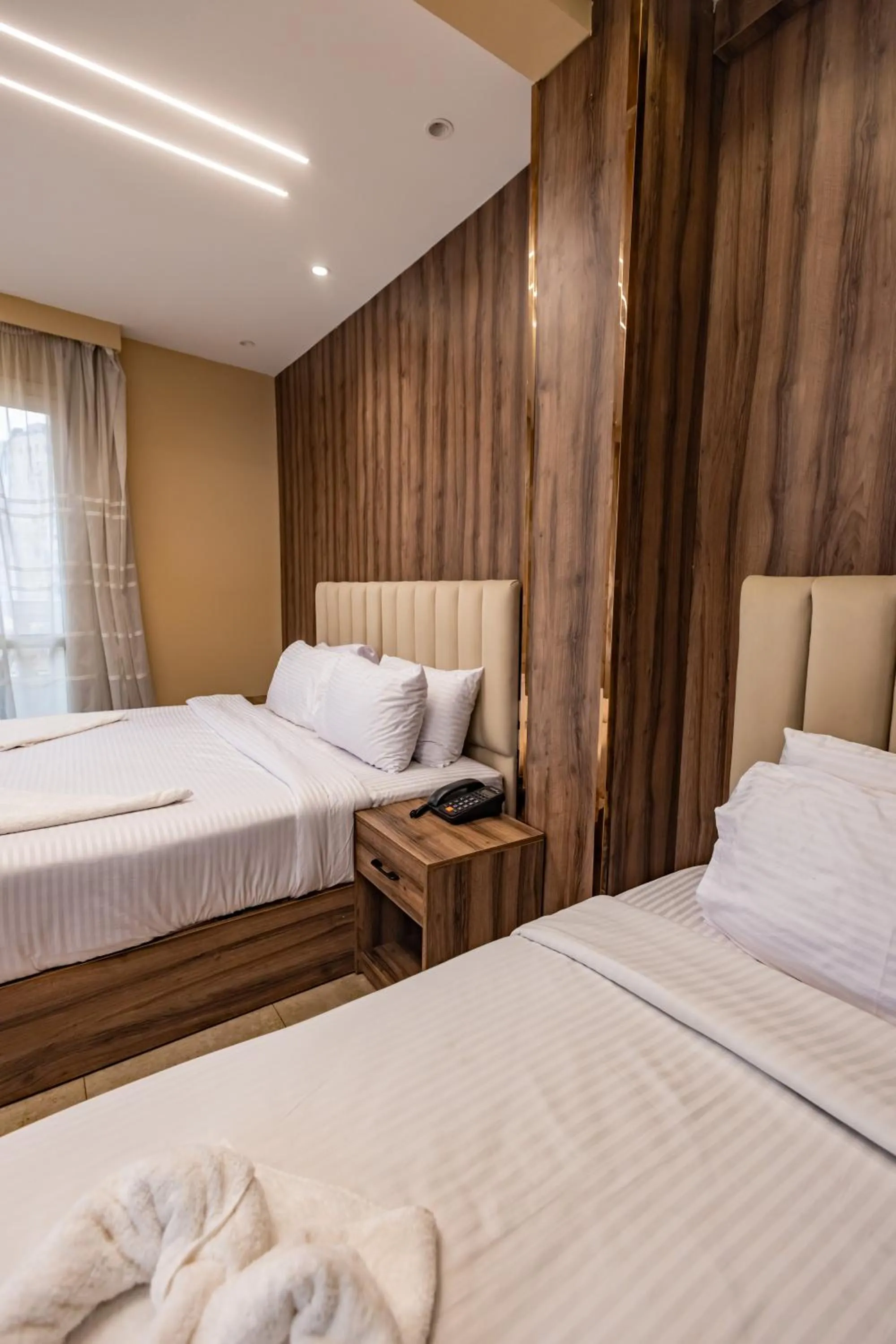 Bed in The Palace Pyramids View Hotel