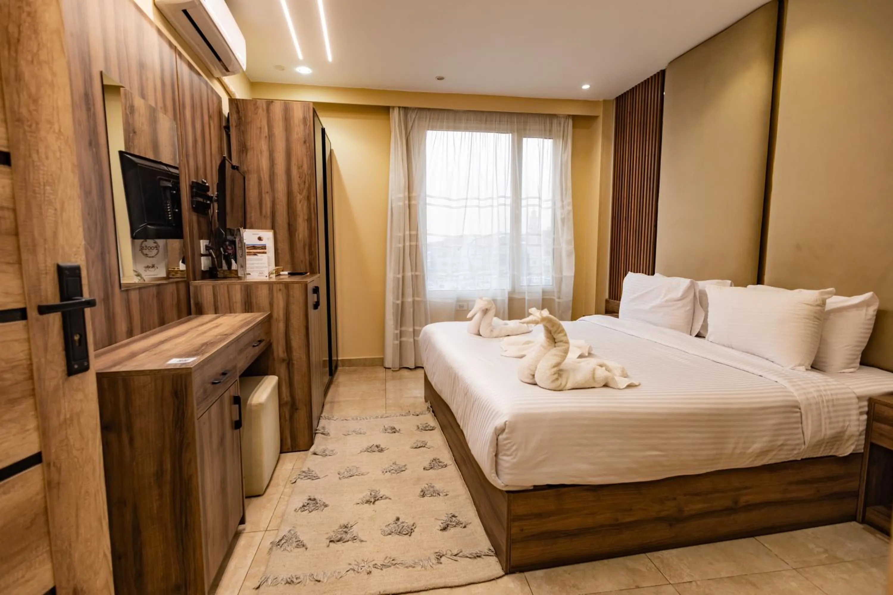 Bed in The Palace Pyramids View Hotel