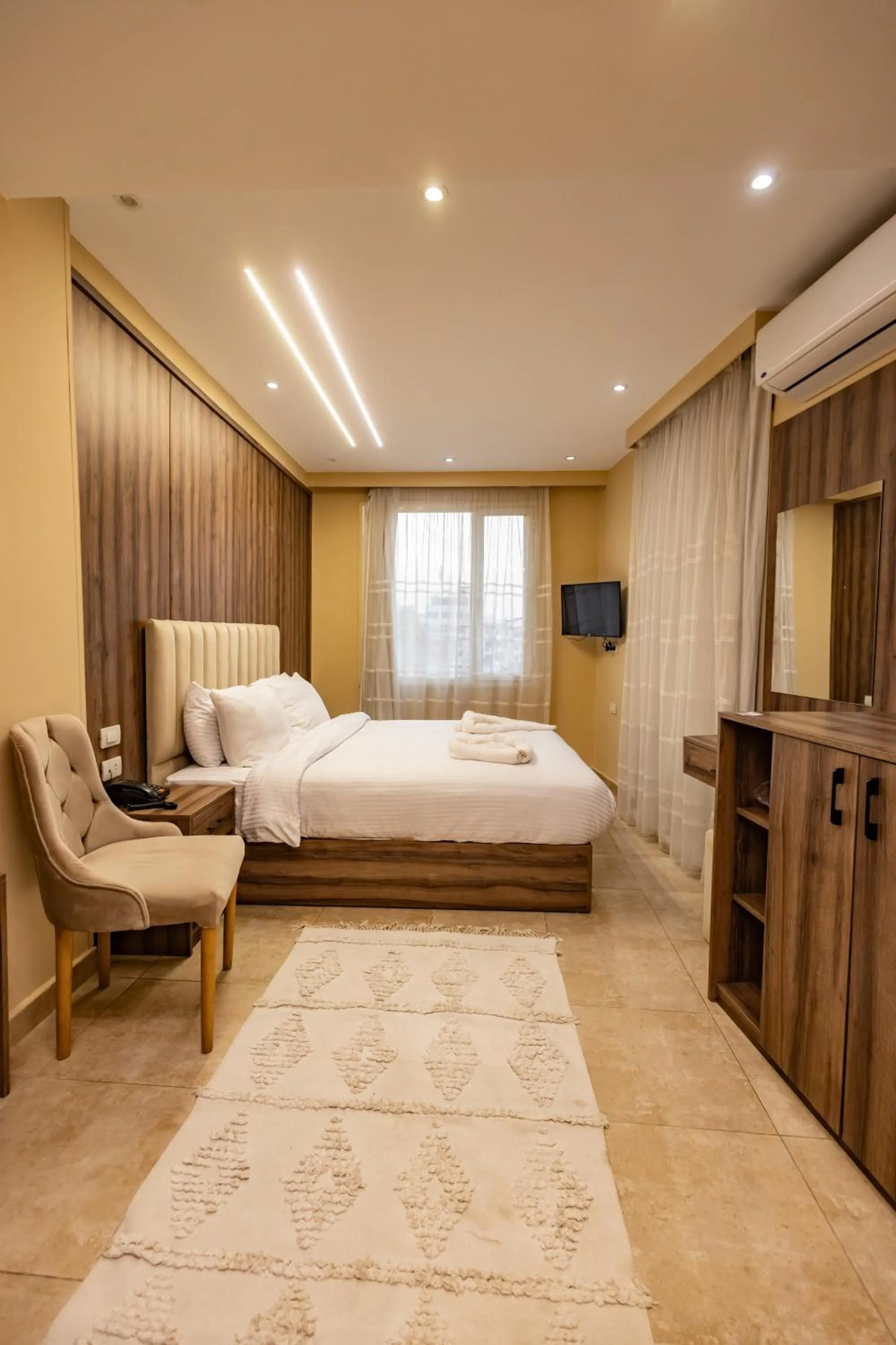 Bed in The Palace Pyramids View Hotel