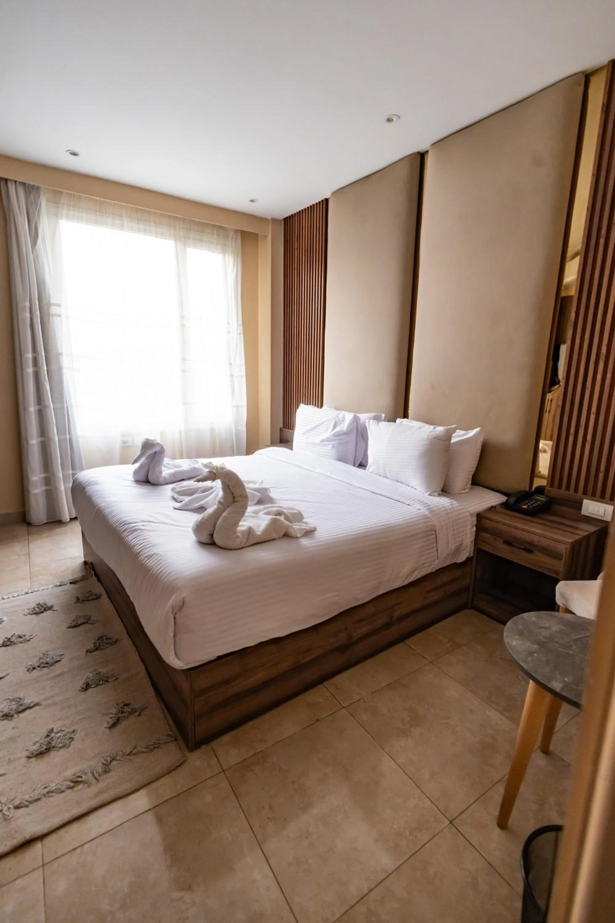 Bed in The Palace Pyramids View Hotel