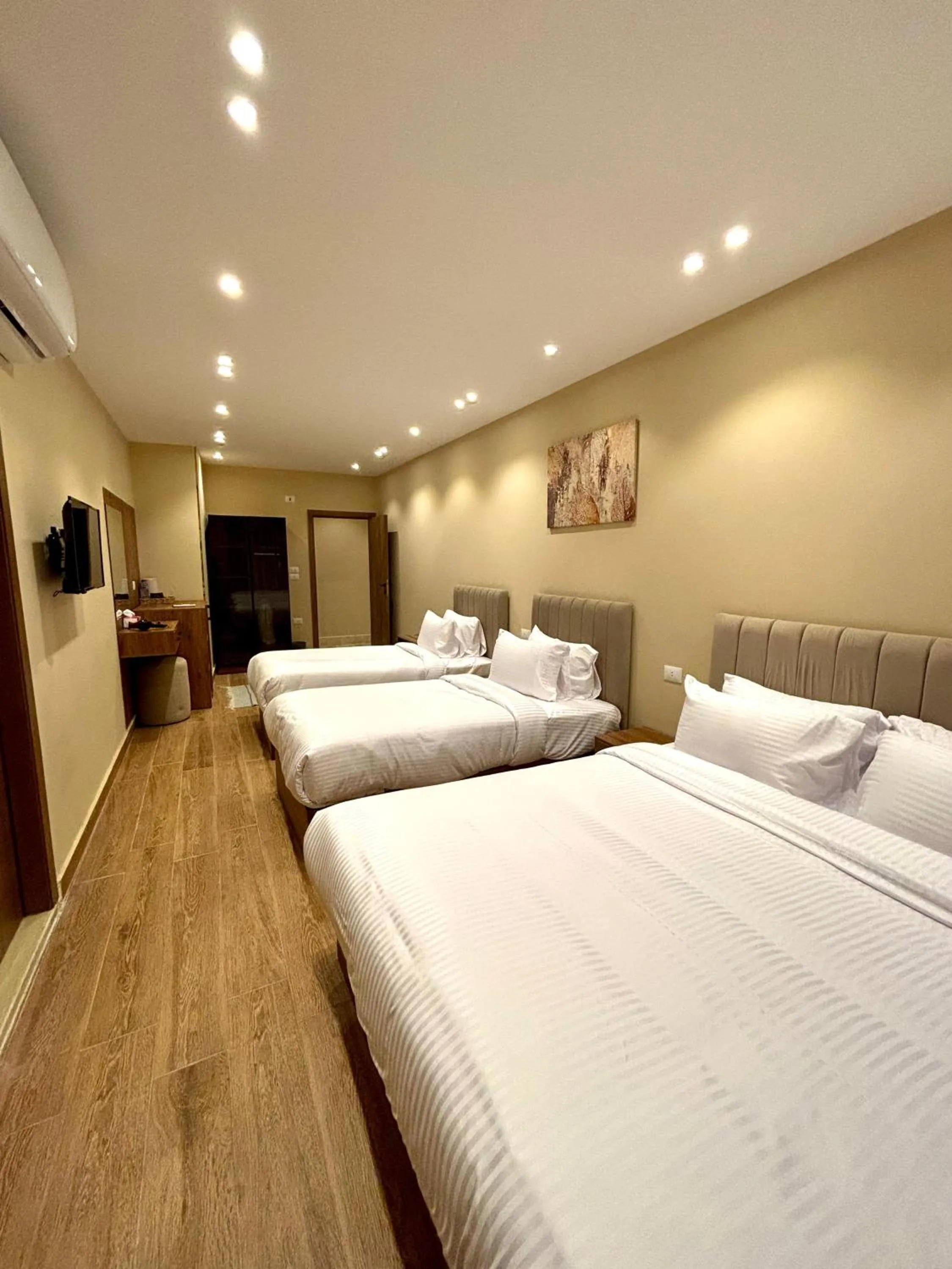 Bed in The Palace Pyramids View Hotel