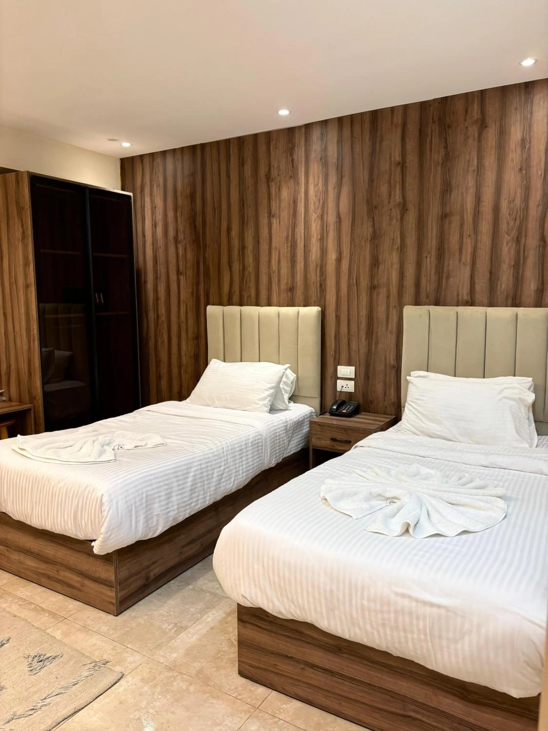 Bed in The Palace Pyramids View Hotel