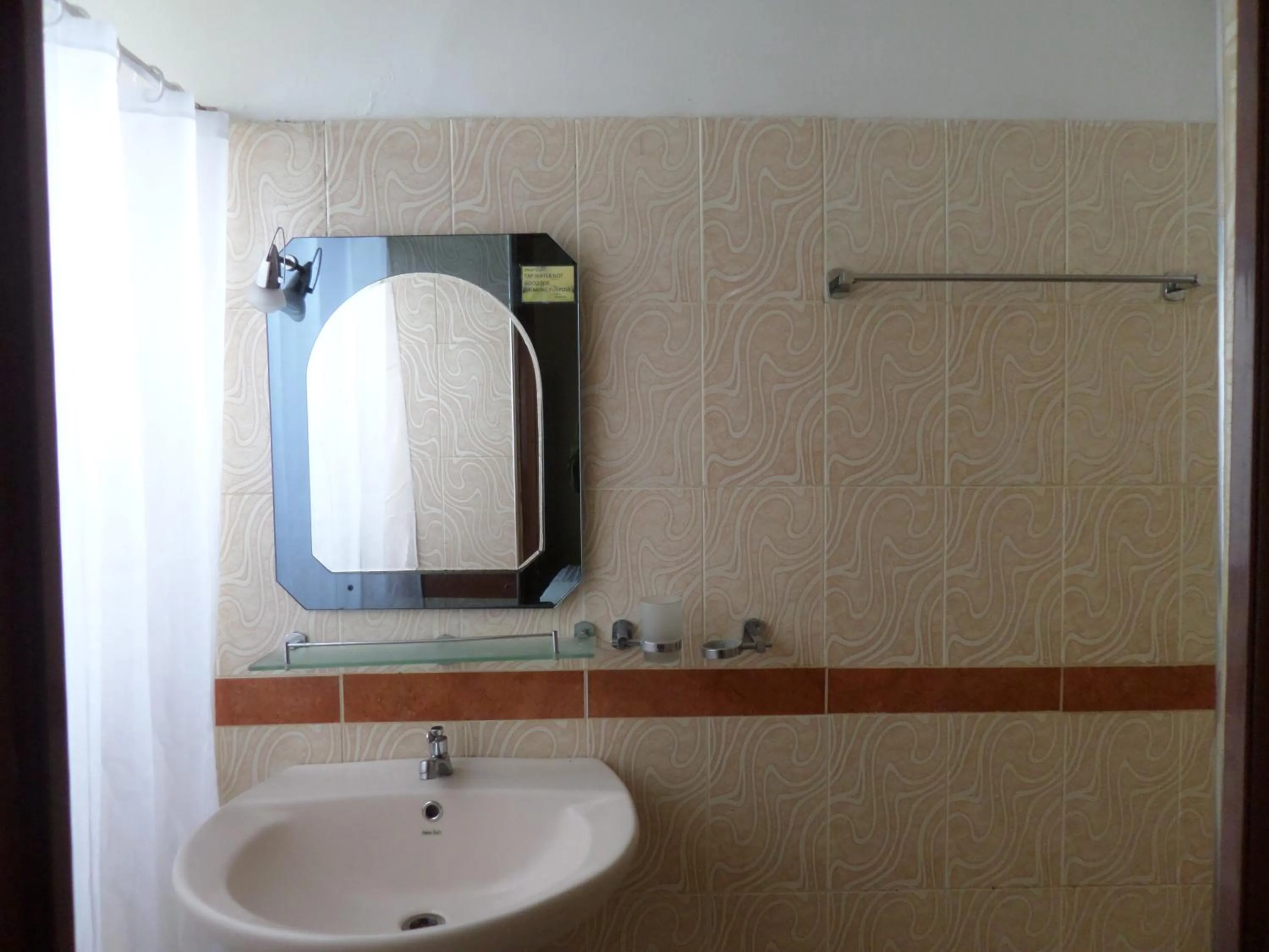 Bathroom in Brighten Hotel