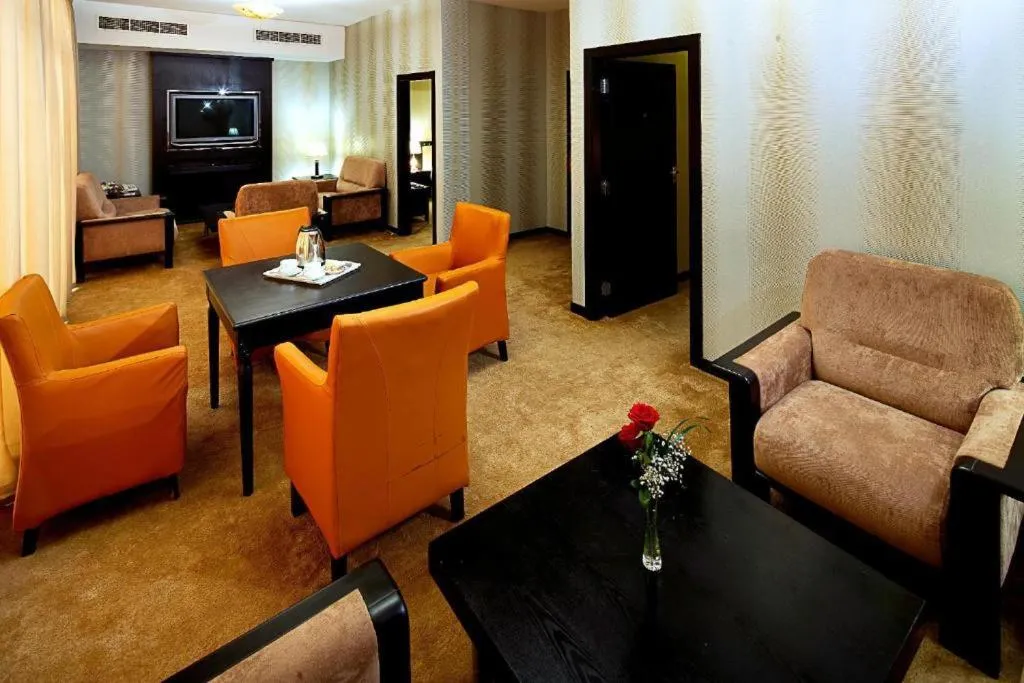 Communal lounge/ TV room in City Point Hotel