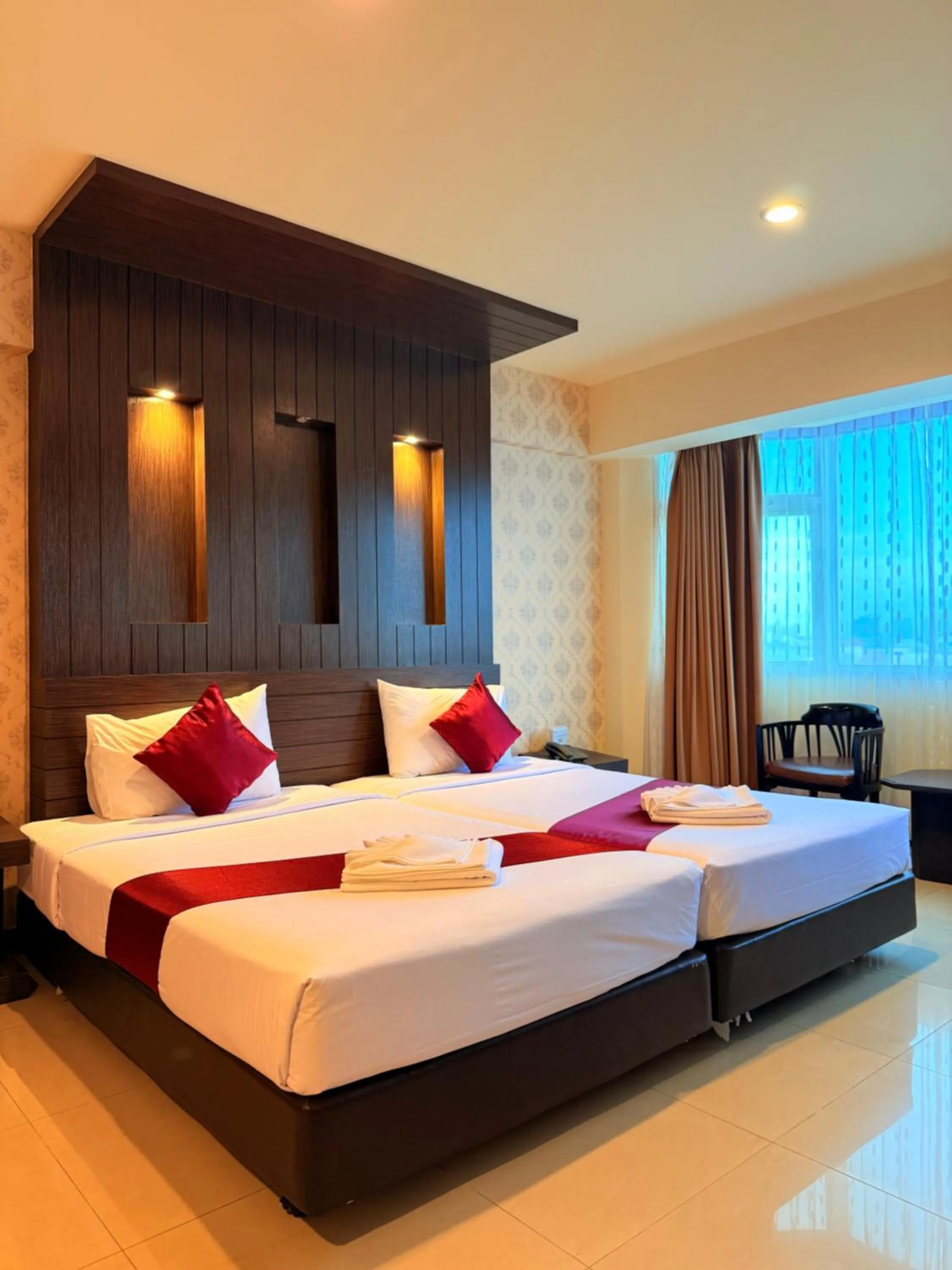 Bed in Suncity Hotel Pattaya