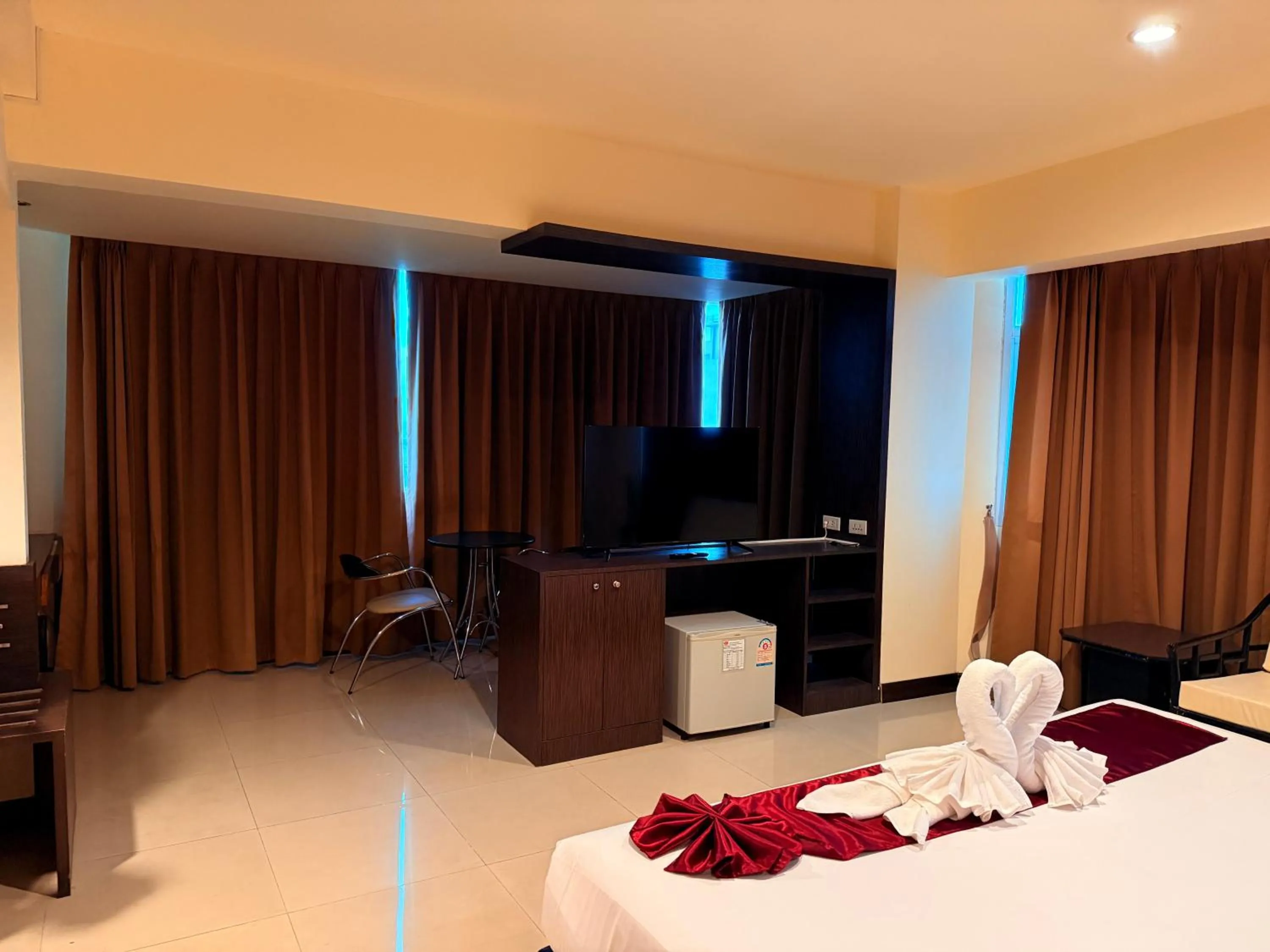 Bed in Suncity Hotel Pattaya