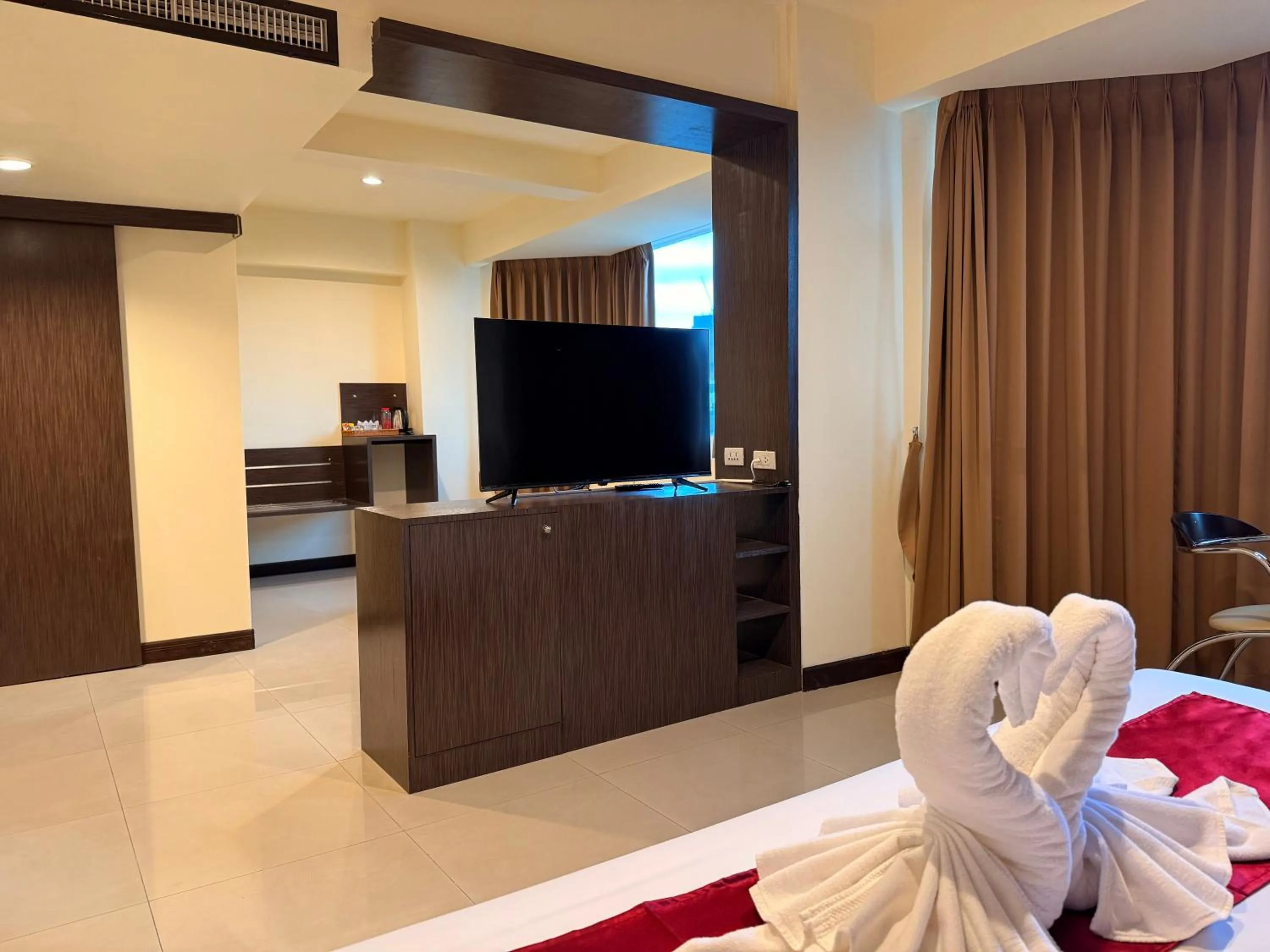 Bed in Suncity Hotel Pattaya