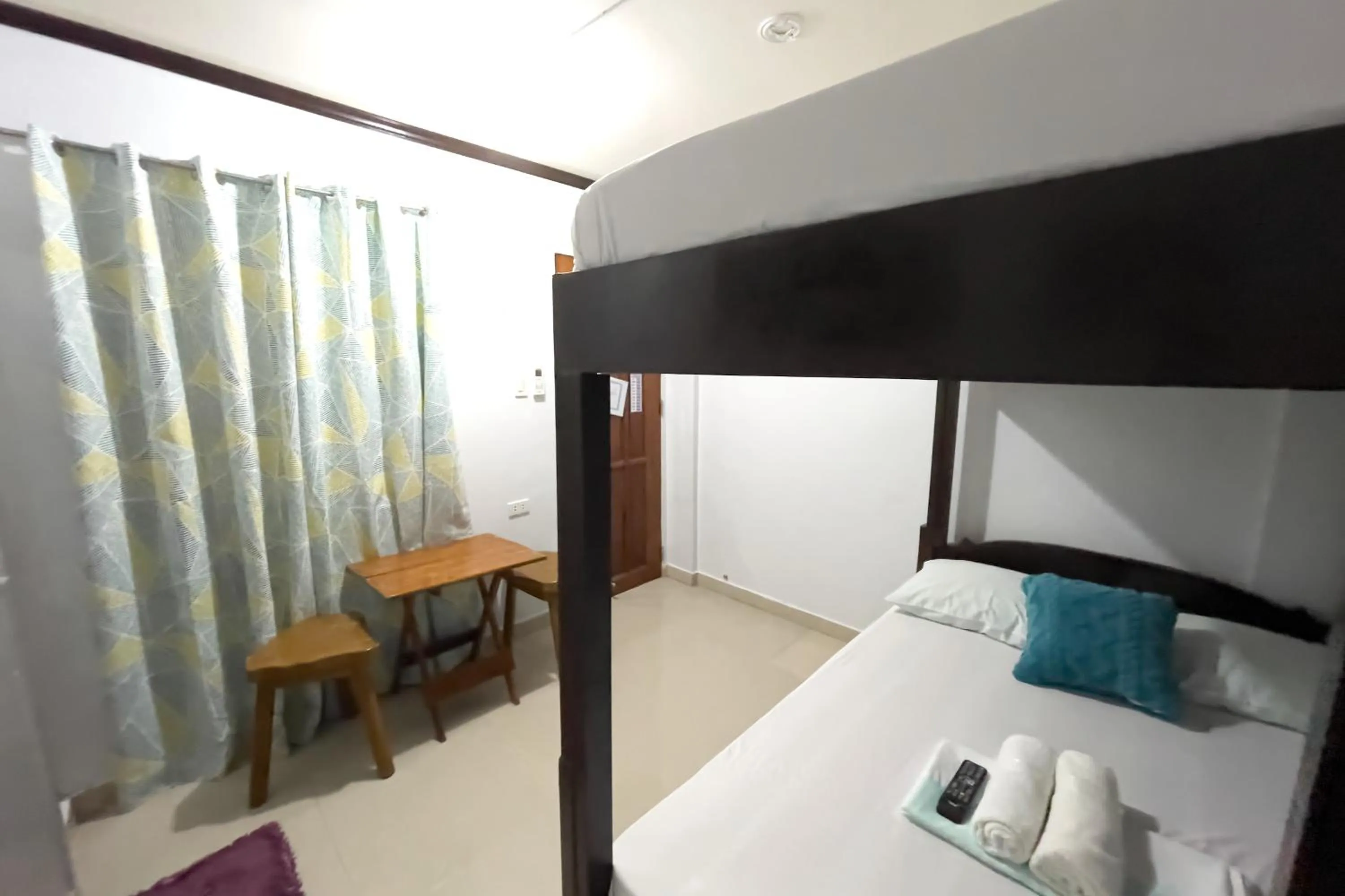 Bed in Catappa Lodge Puerto Galera