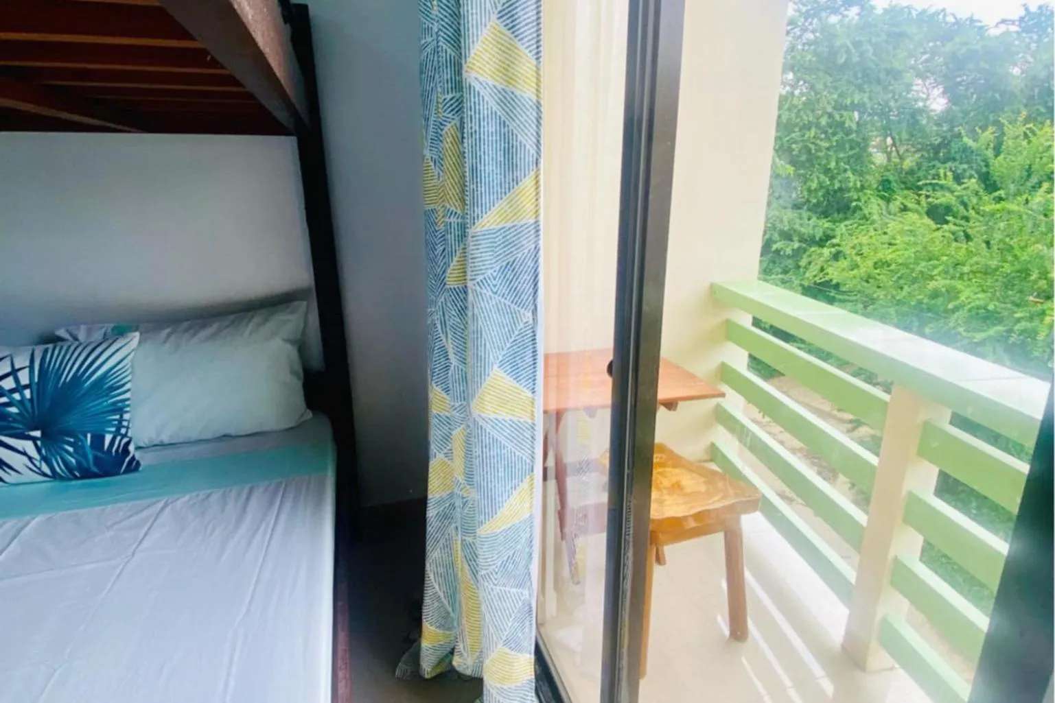 Bed in Catappa Lodge Puerto Galera