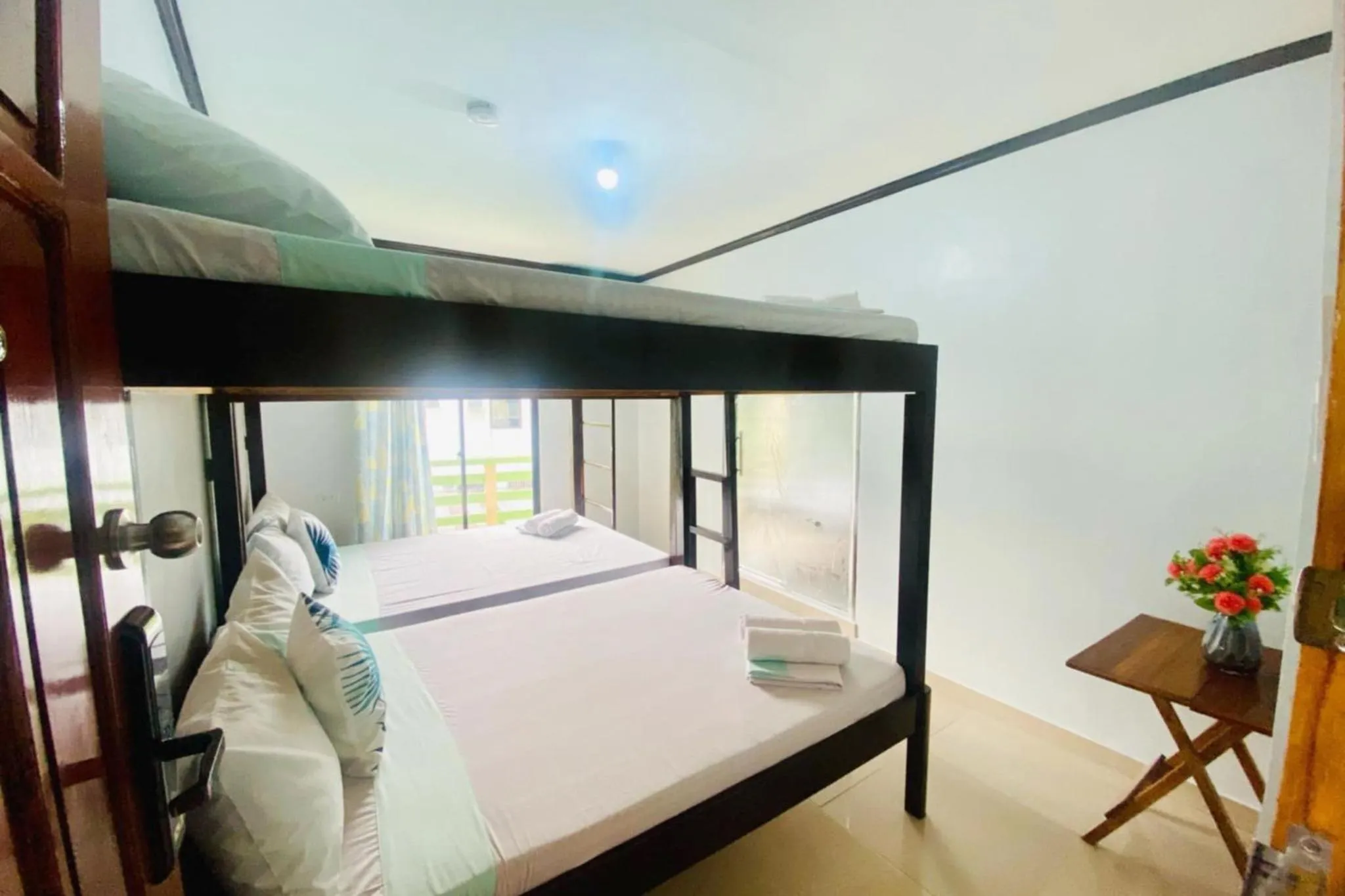 Bed in Catappa Lodge Puerto Galera