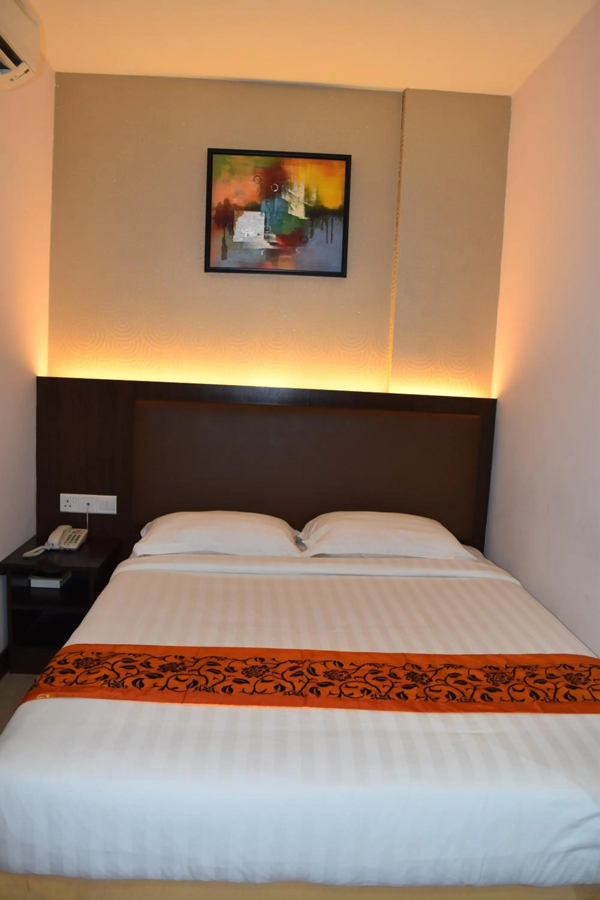 Bed in Sunrise Hotel