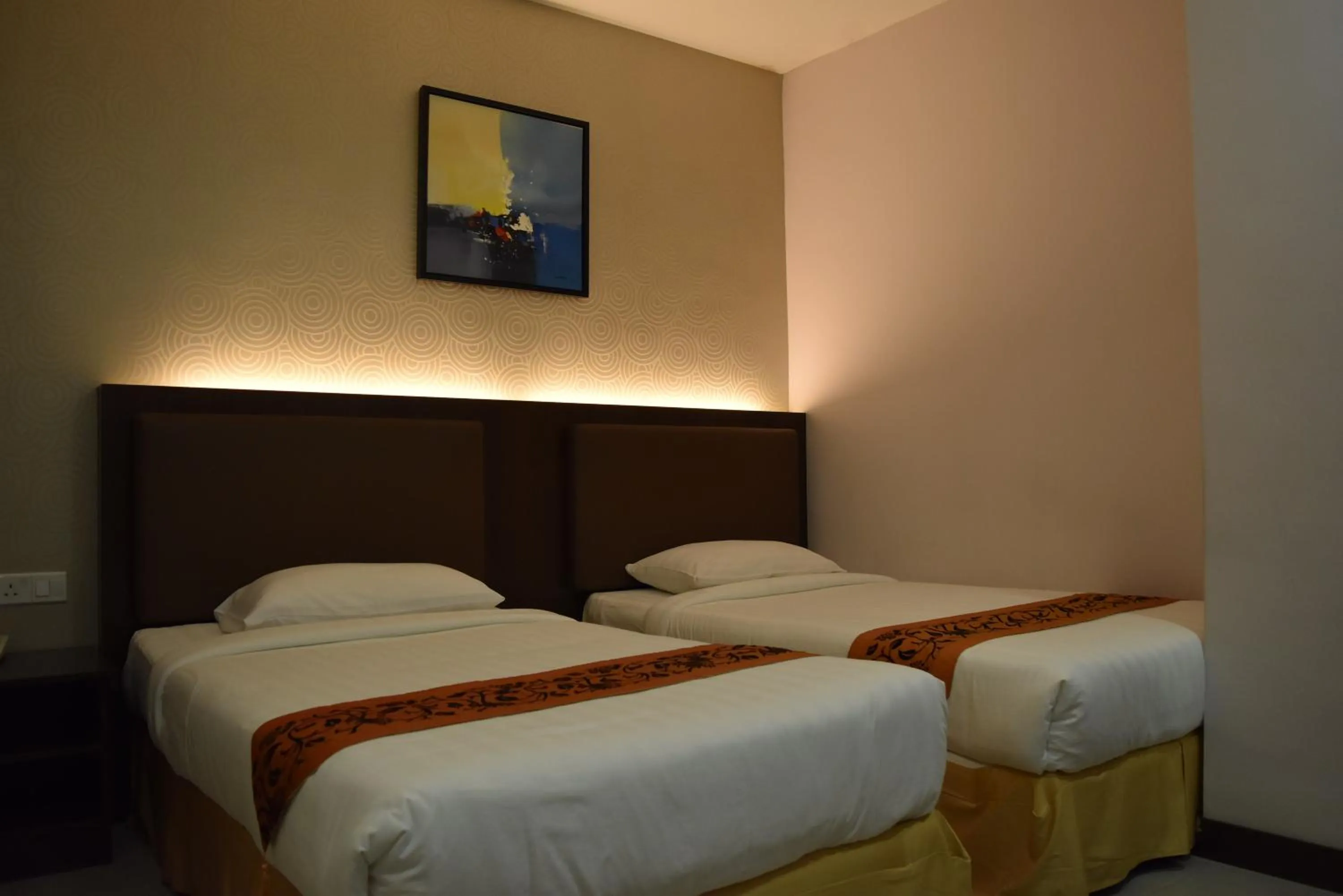 Bed in Sunrise Hotel