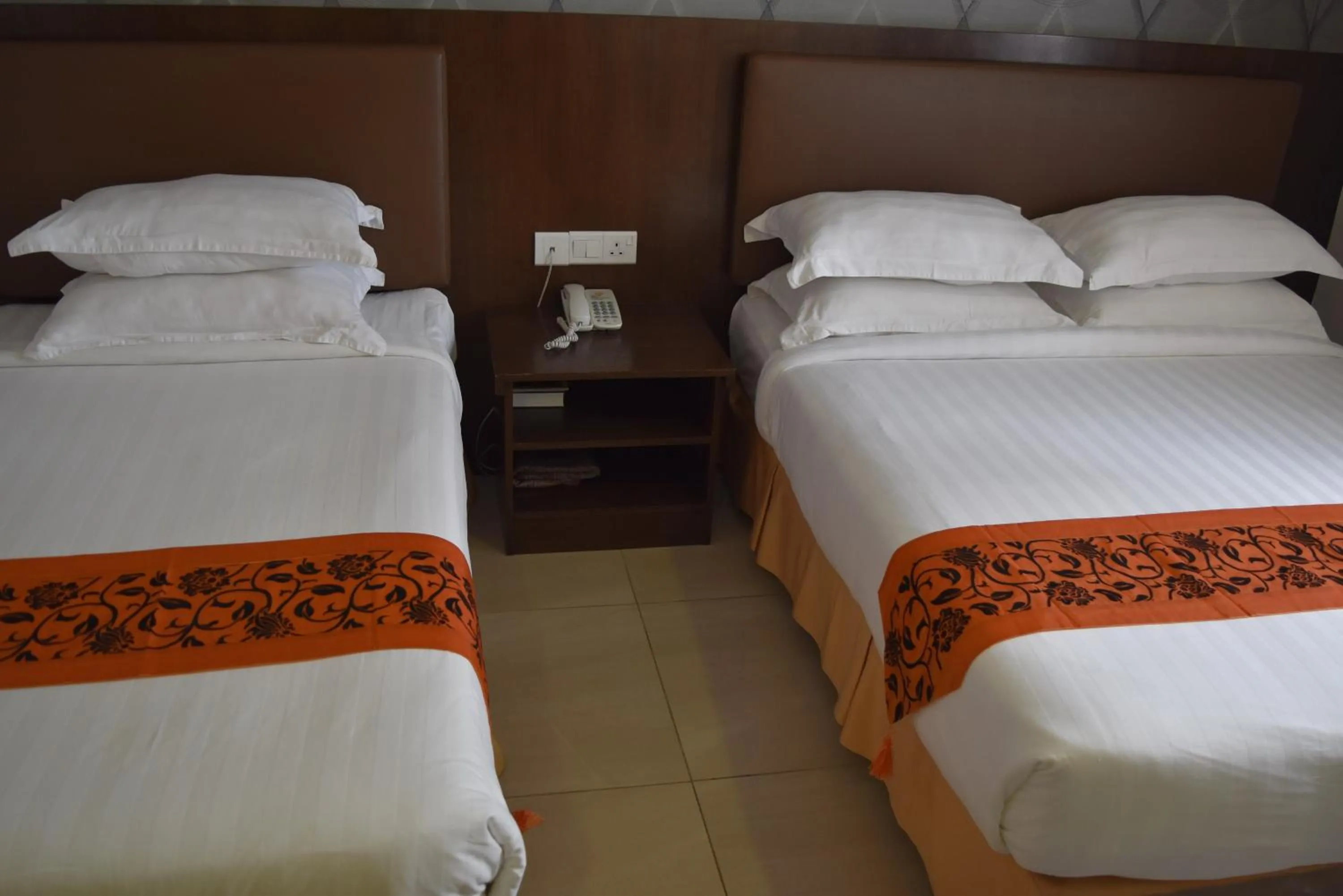 Bed in Sunrise Hotel