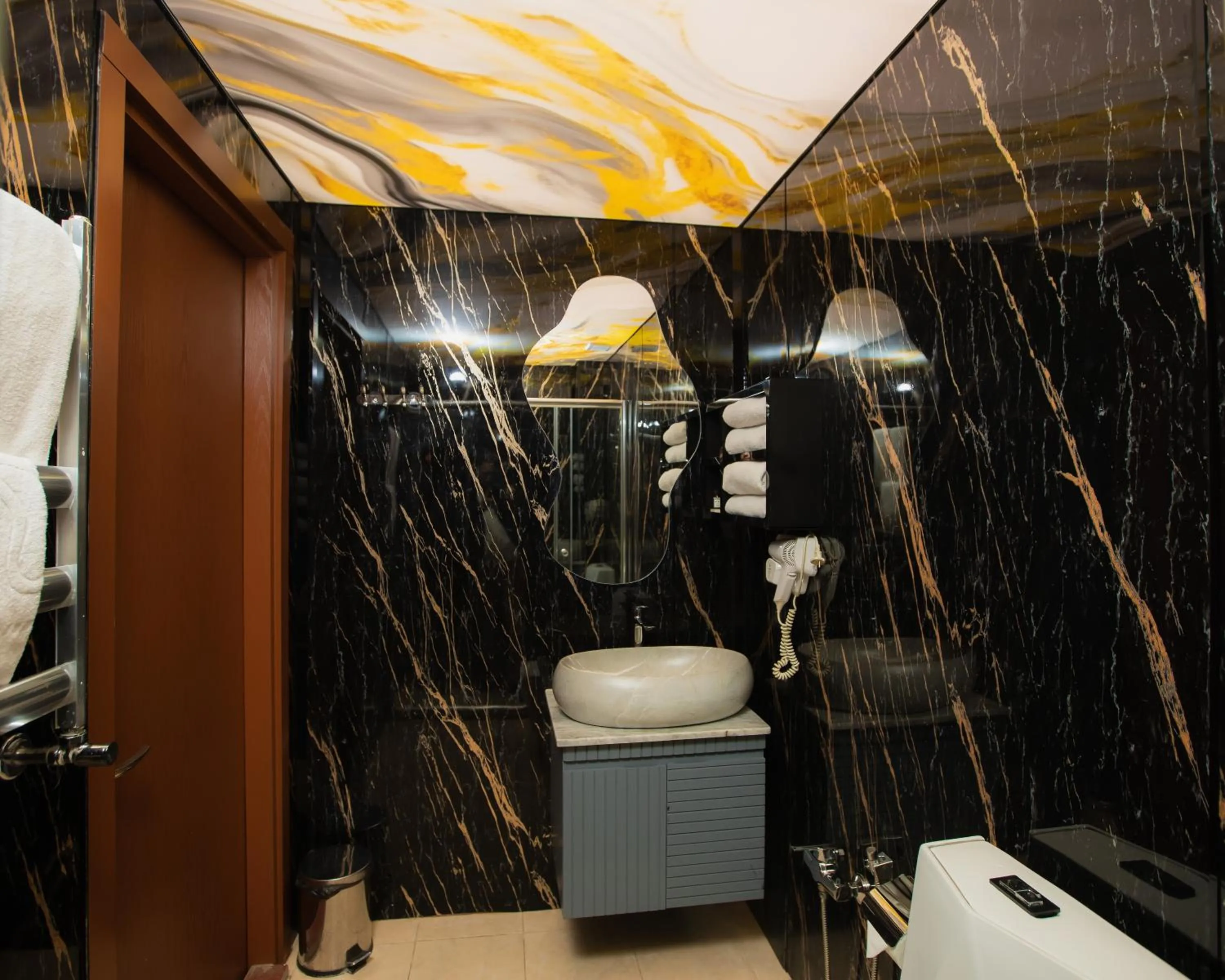 Shower in Corniche White City Hotel