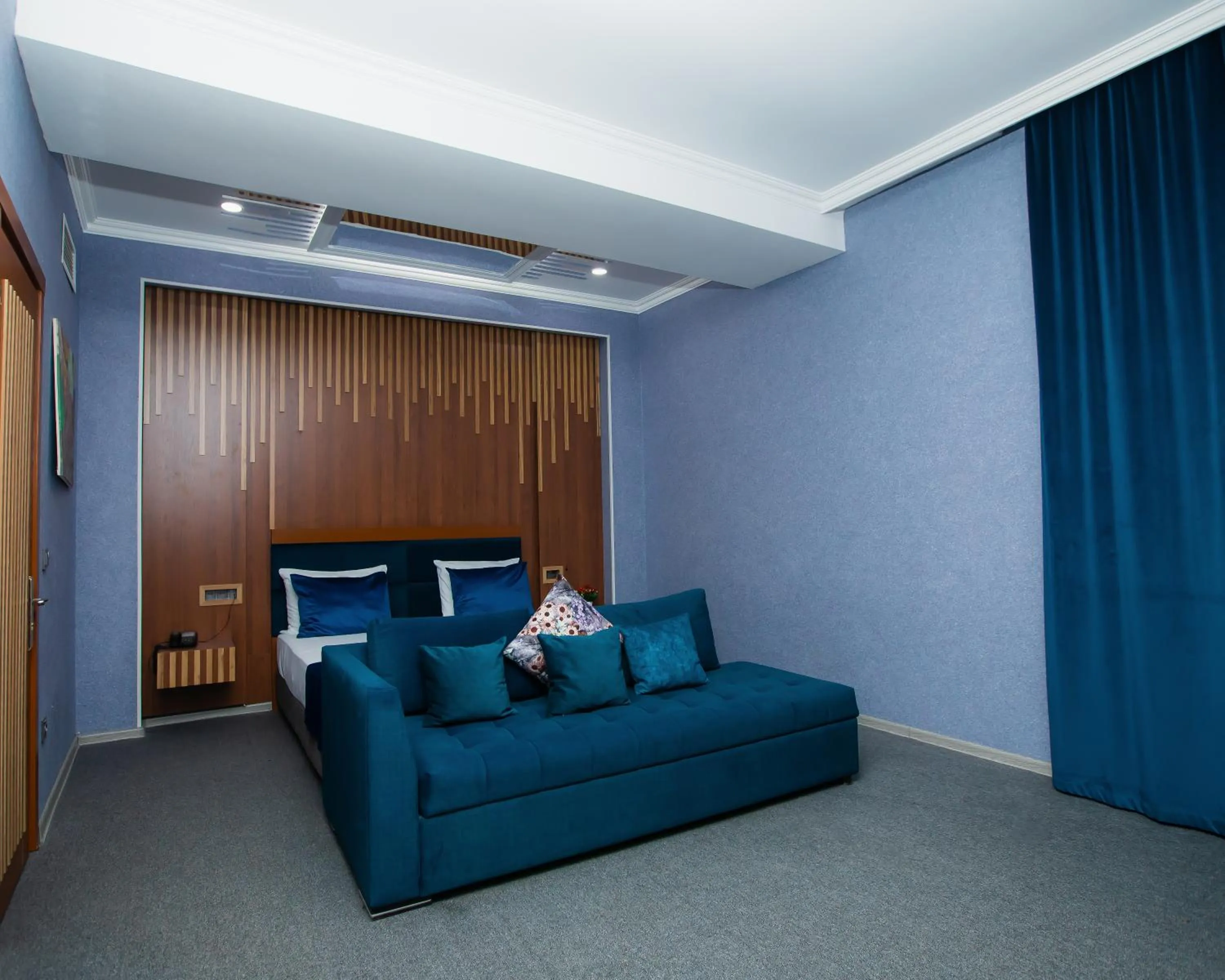 Bed in Corniche White City Hotel