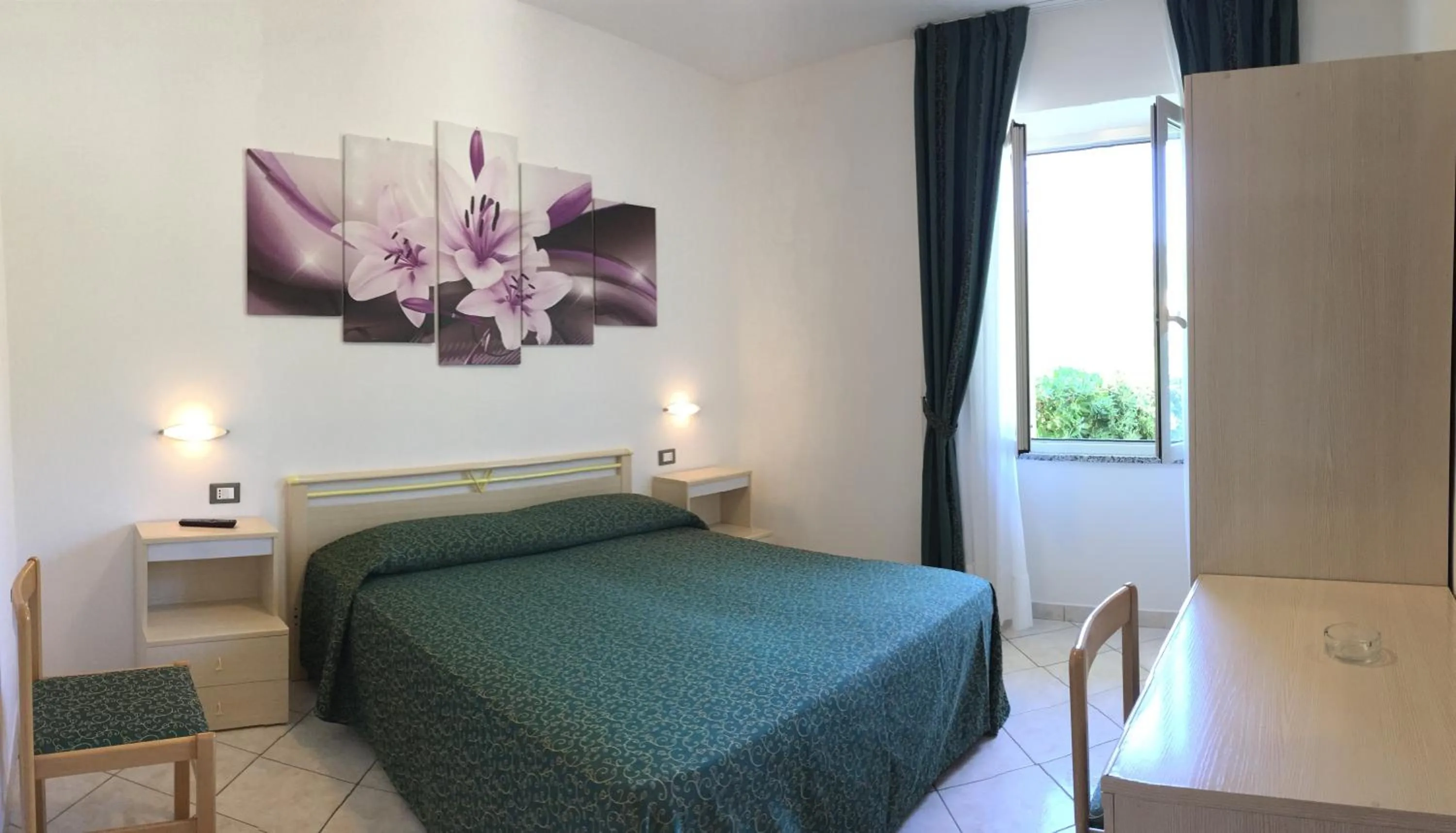 Bed in Hotel Barbarossa