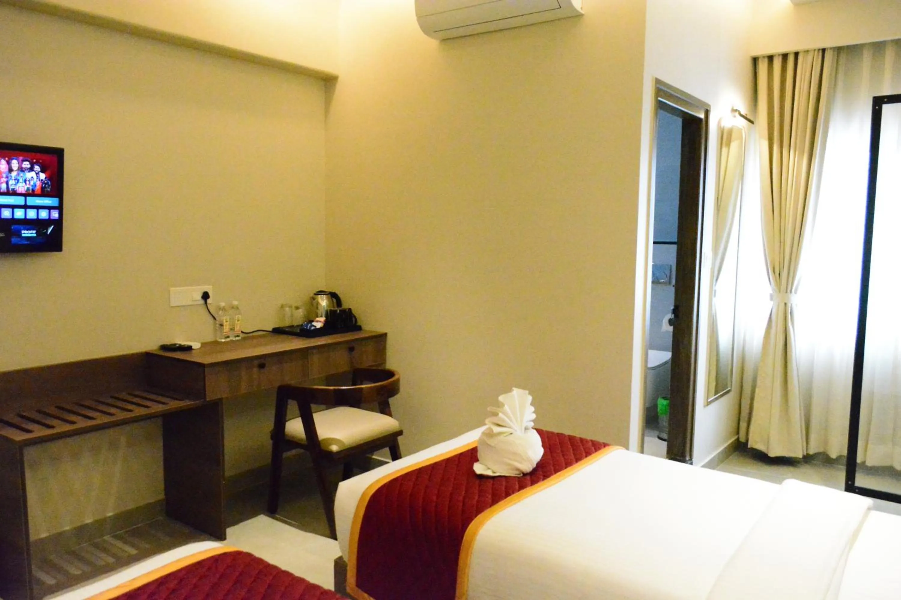 Bed in Hotel Muthahalli Grand