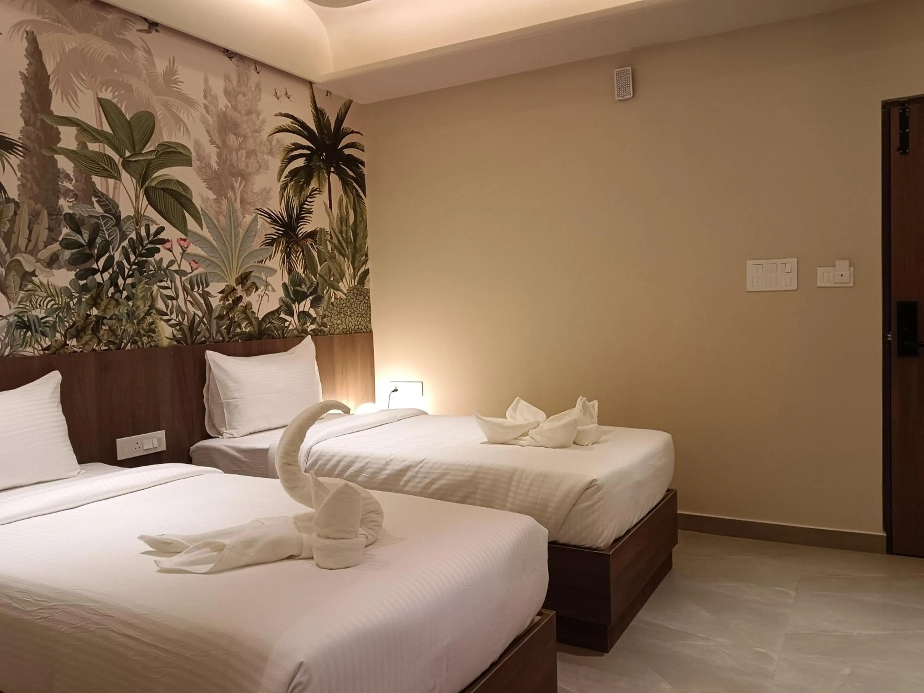 Bed in Hotel Muthahalli Grand