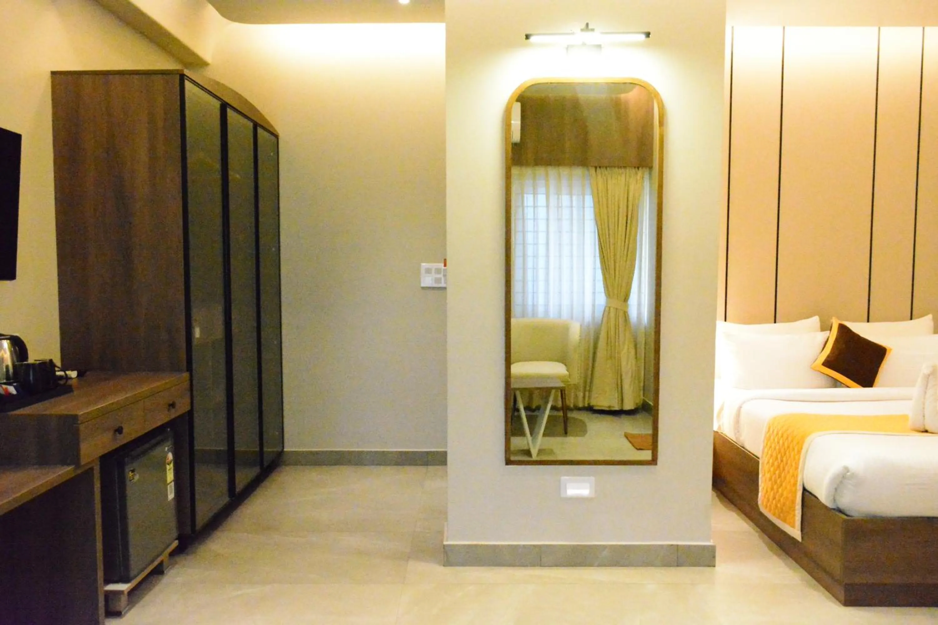 Bed in Hotel Muthahalli Grand