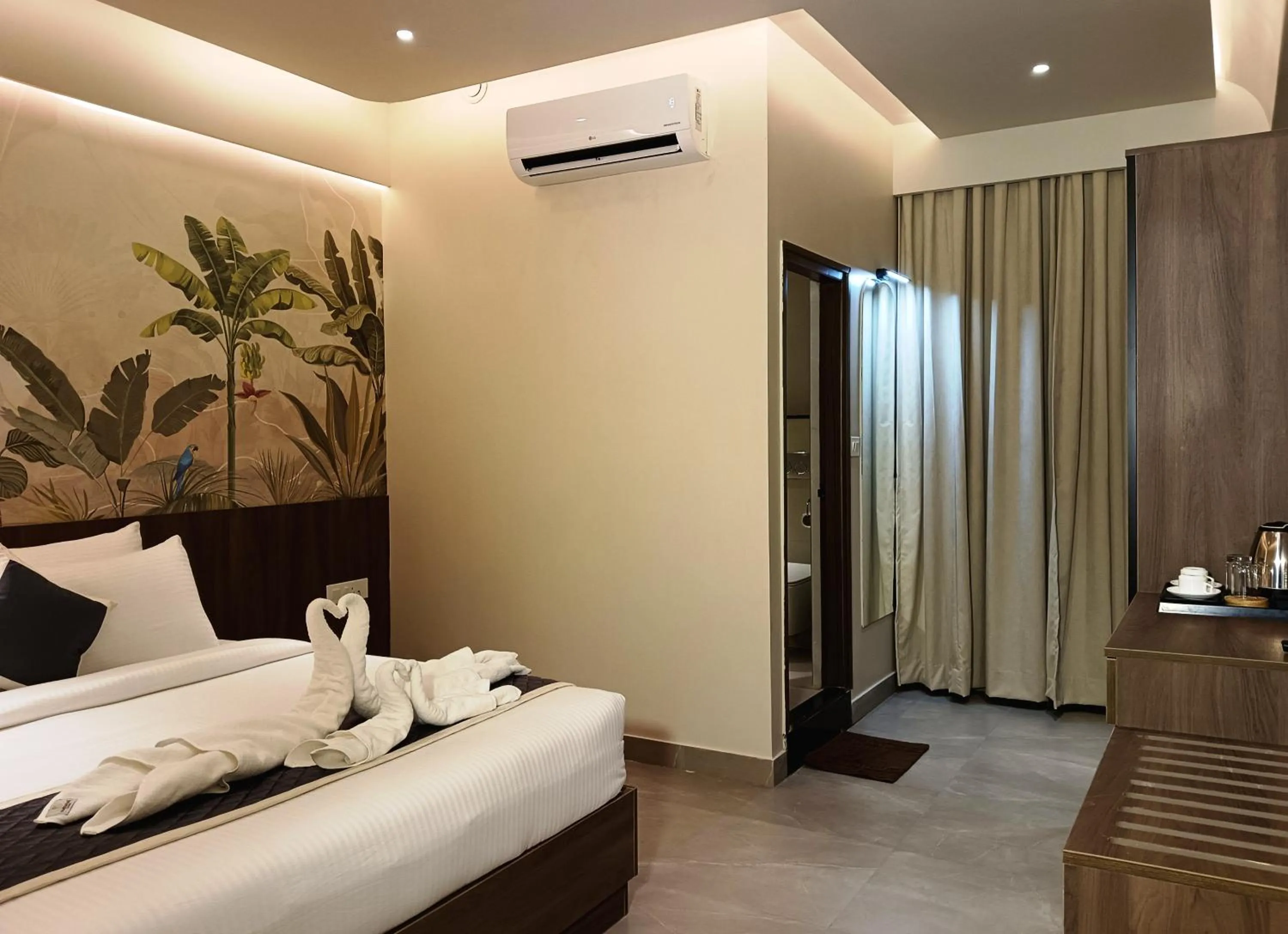 Bed in Hotel Muthahalli Grand